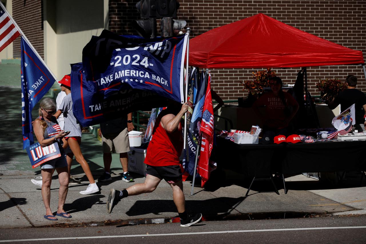 Trump supporters rally during early voting