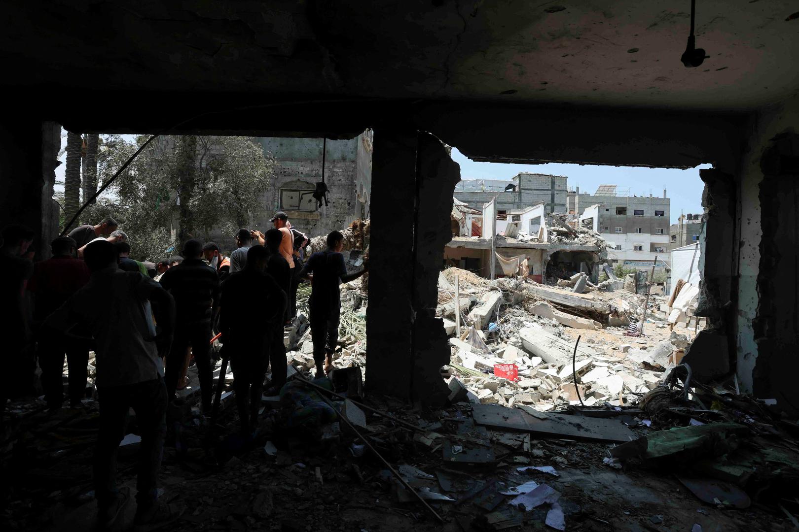 Palestinians inspect a school sheltering displaced people following an Israeli strike, amid Israel-Hamas conflict, in Deir Al-Balah in the central Gaza Strip, July 27, 2024. REUTERS/Ramadan Abed Photo: Ramadan Abed/REUTERS