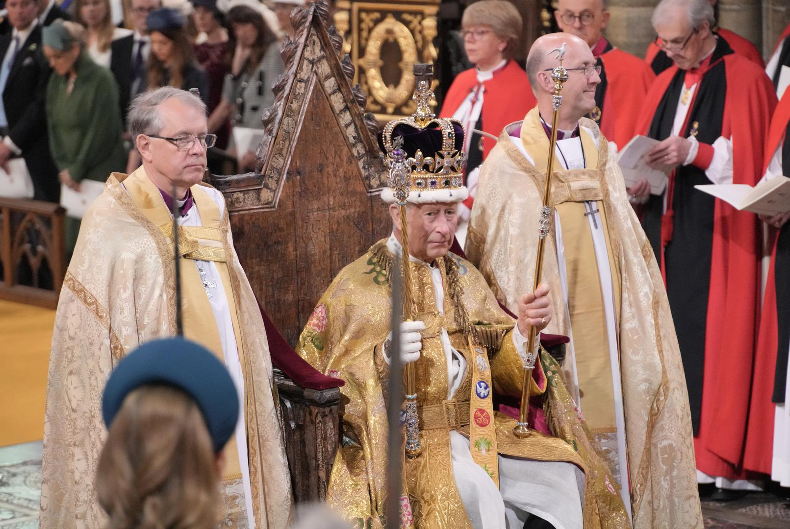 King Charles III is crowned with St Edward's Crown by The Archbishop of Canterbury the Most Reverend Justin Welby during his coronation ceremony in Westminster Abbey, London. Picture date: Saturday May 6, 2023. Photo: Jonathan Brady/PRESS ASSOCIATION