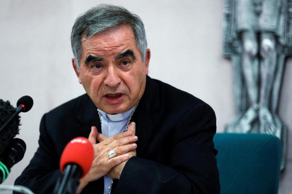 FILE PHOTO: Cardinal Giovanni Angelo Becciu speaks to the media in Rome