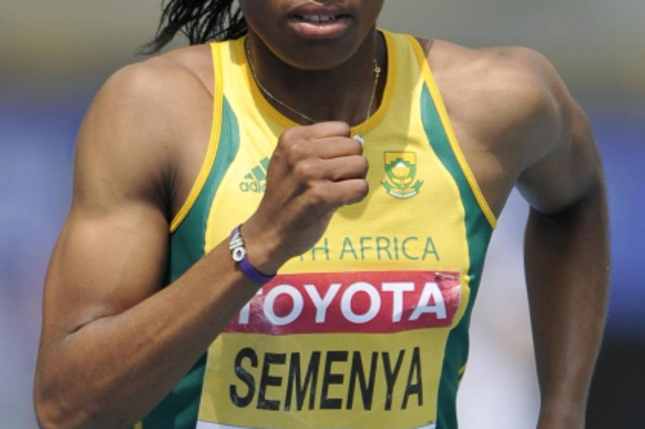 'Caster Semenya of South Africa runs at the start of her women\'s 800 metres heat at the IAAF World Championships in Daegu September 1, 2011. REUTERS/Dylan Martinez (SOUTH KOREA  - Tags: SPORT ATHLETI