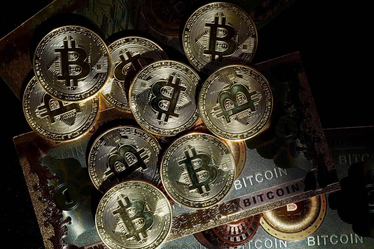 FILE PHOTO: Illustration shows representations of cryptocurrency bitcoin