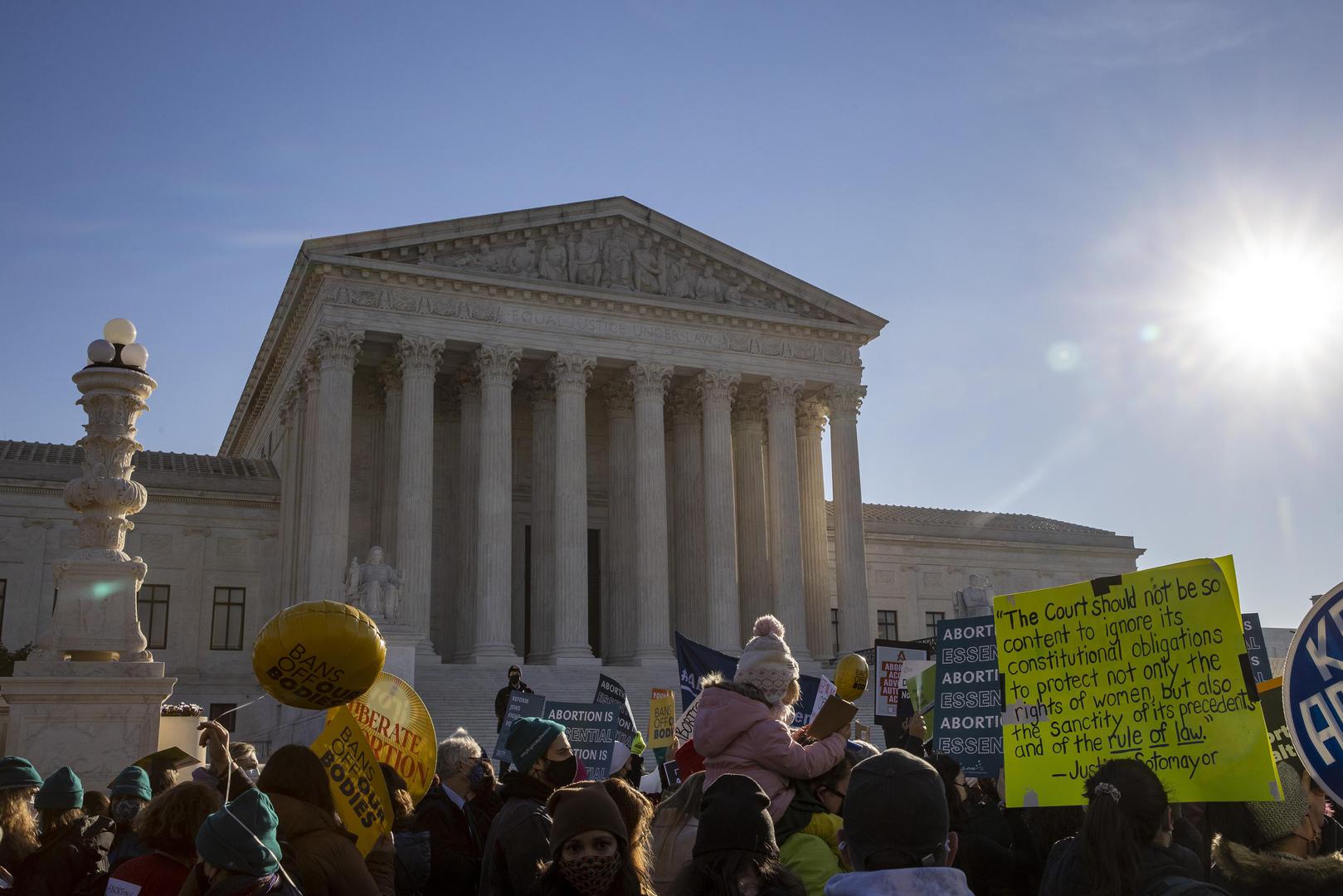 Protesters gather at the Supreme Court in Washington, D.C. on Wednesday, December 1, 2021. The court heard today the case Dobbs v. Jackson Women's Health Organization on the Mississippi law that bans nearly all abortions after 15 weeks. It is expected to be a direct challenge to the 1973 decision to  Roe v. Wade landmark case.    Photo by Tasos Katopodis/UPI . Photo via Newscom