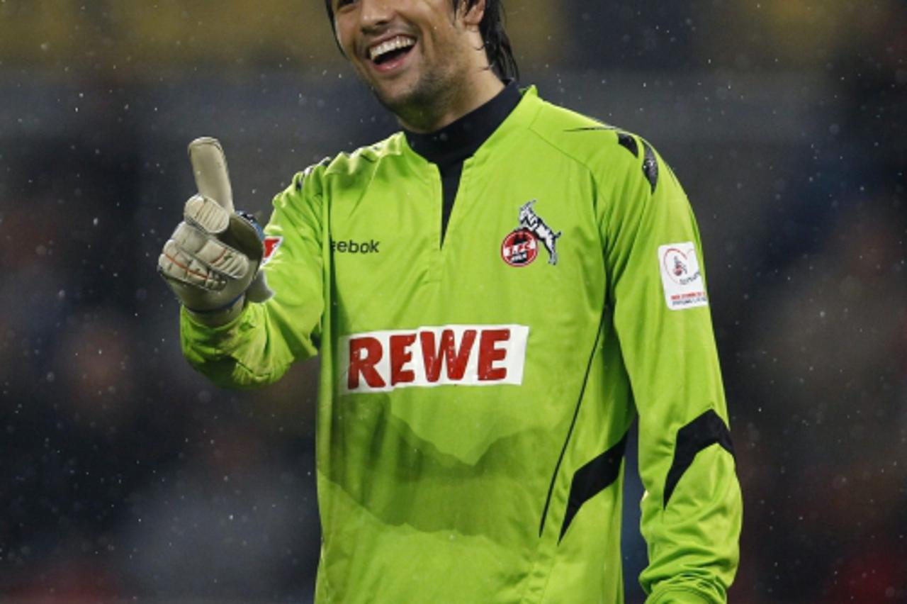 \'Cologne\'s Miro Varvodic gestures during the German Bundesliga soccer match against Borussia Dortmund in Cologne October 15, 2010. REUTERS/Ina  Fassbender (GERMANY - Tags: SPORT SOCCER) ONLINE CLIEN