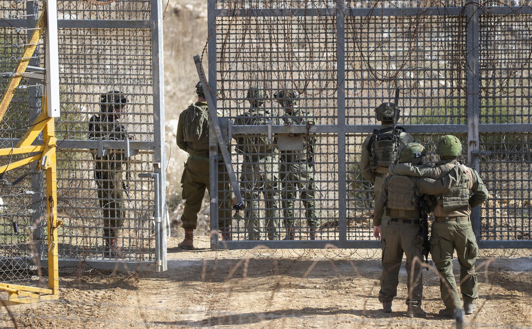 Israeli IDF soldiers embrace as they meet at the border fence with Syria in the northern Israeli-controlled Golan Heights on December 10, 2024 as commanders look over the territory. Israel is extending is presence on the ground inside Syria following the Syrian rebel takeover of most of the country in the past days. Photo by Jim Hollander/UPI Photo via Newscom Photo: JIM HOLLANDER/NEWSCOM