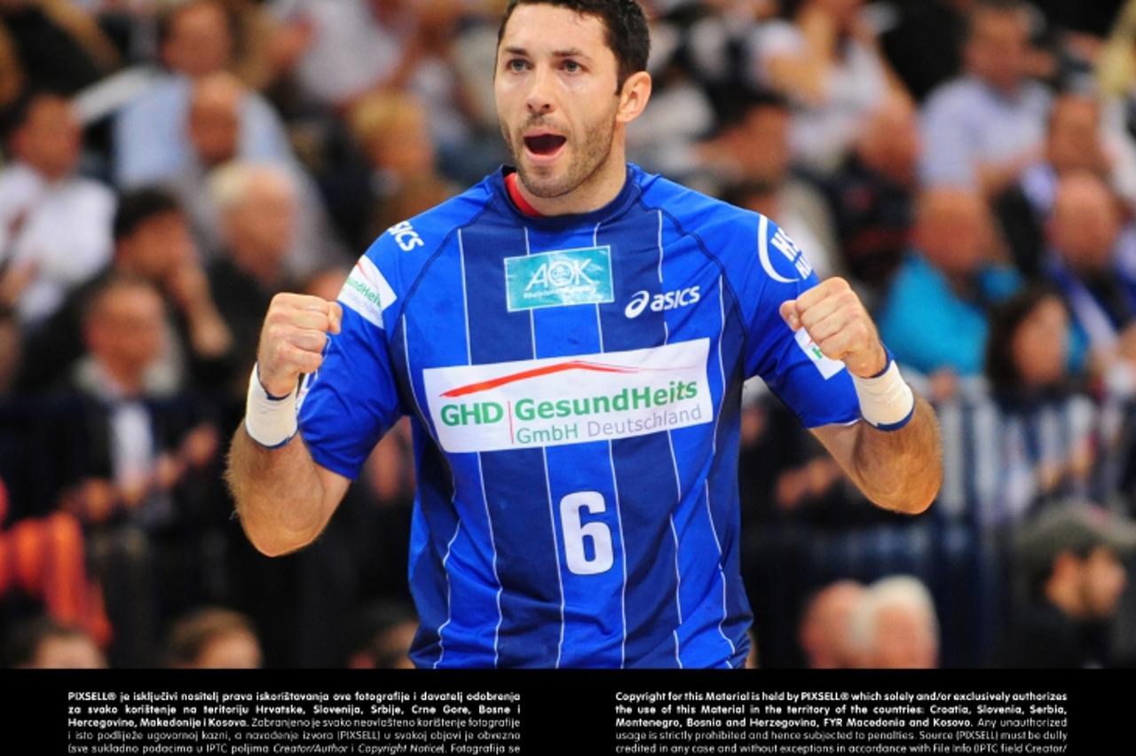 'Blazenko Lackovic of Hamburg cheers during the Handball Bundesliga match HSV Hamburg versus VfL Gummersbach at O2 World in Hamburg, Germany, 16 May 2012. Foto: Revierfoto/DPA/PIXSELL'