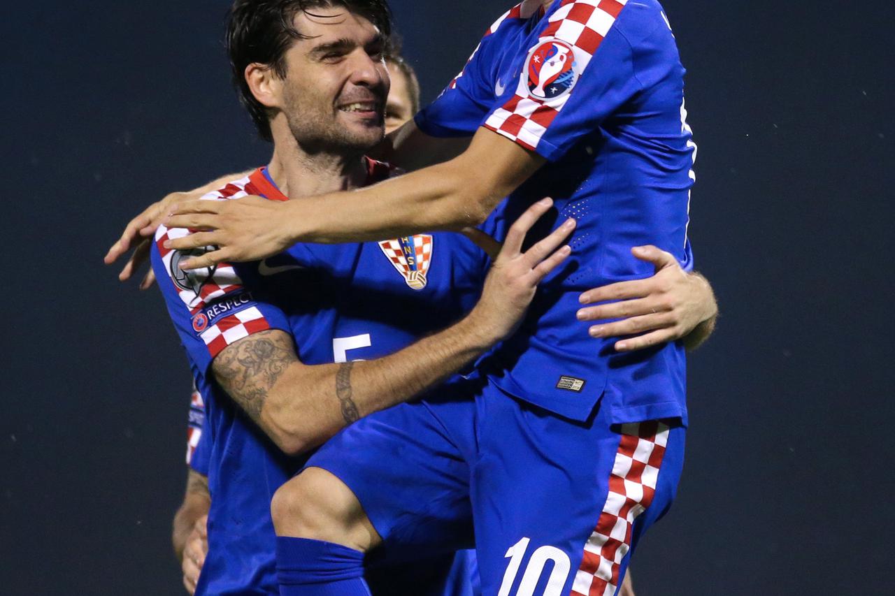 09.09.2014., stadion Maksimir, Zagreb - Kvalifikacijska utakmica za Europsko prvenstvo u nogometu 2016. u Francuskoj, skupina H, 1. kolo, Hrvatska - Malta. Luka Modric, Vedran Corluka. Photo: Sanjin Strukic/PIXSELL