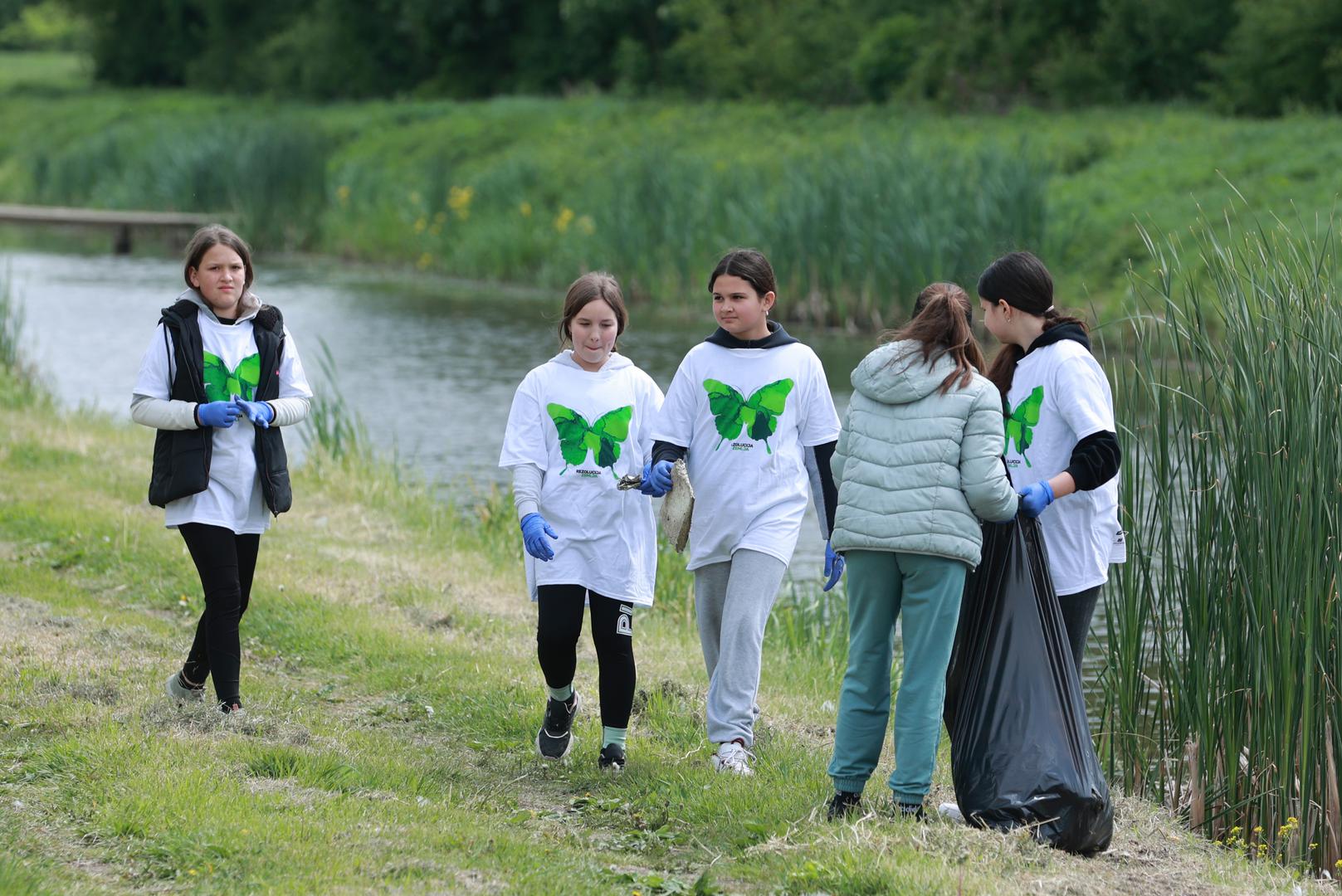 PRI KORISTENJU FOTOTGRAFIJE ZASTITITI IDENTITET DJETETA! (PREKRITI OCI). 21.04.2024., Bosnjaci - Rezolucija Zemlja akcija ciscenja Savjet mladih Opcine Bosnjaci. Photo: Davor Javorovic/PIXSELL