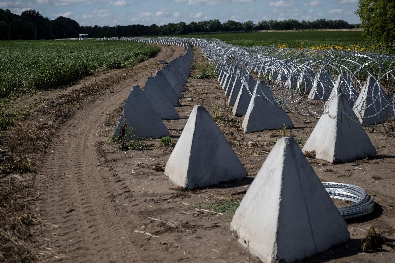 FILE PHOTO: A view of newly installed anti-tank fortifications and razor wire near the Russian border in Sumy region