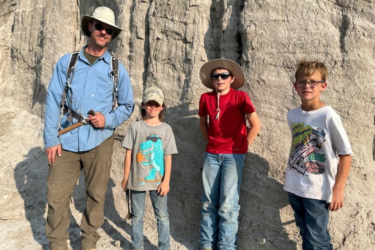 Paleontologist Tyler Lyson and a three of young fossil finders – Liam Fisher, Jessin Fisher and Kaiden Madsen