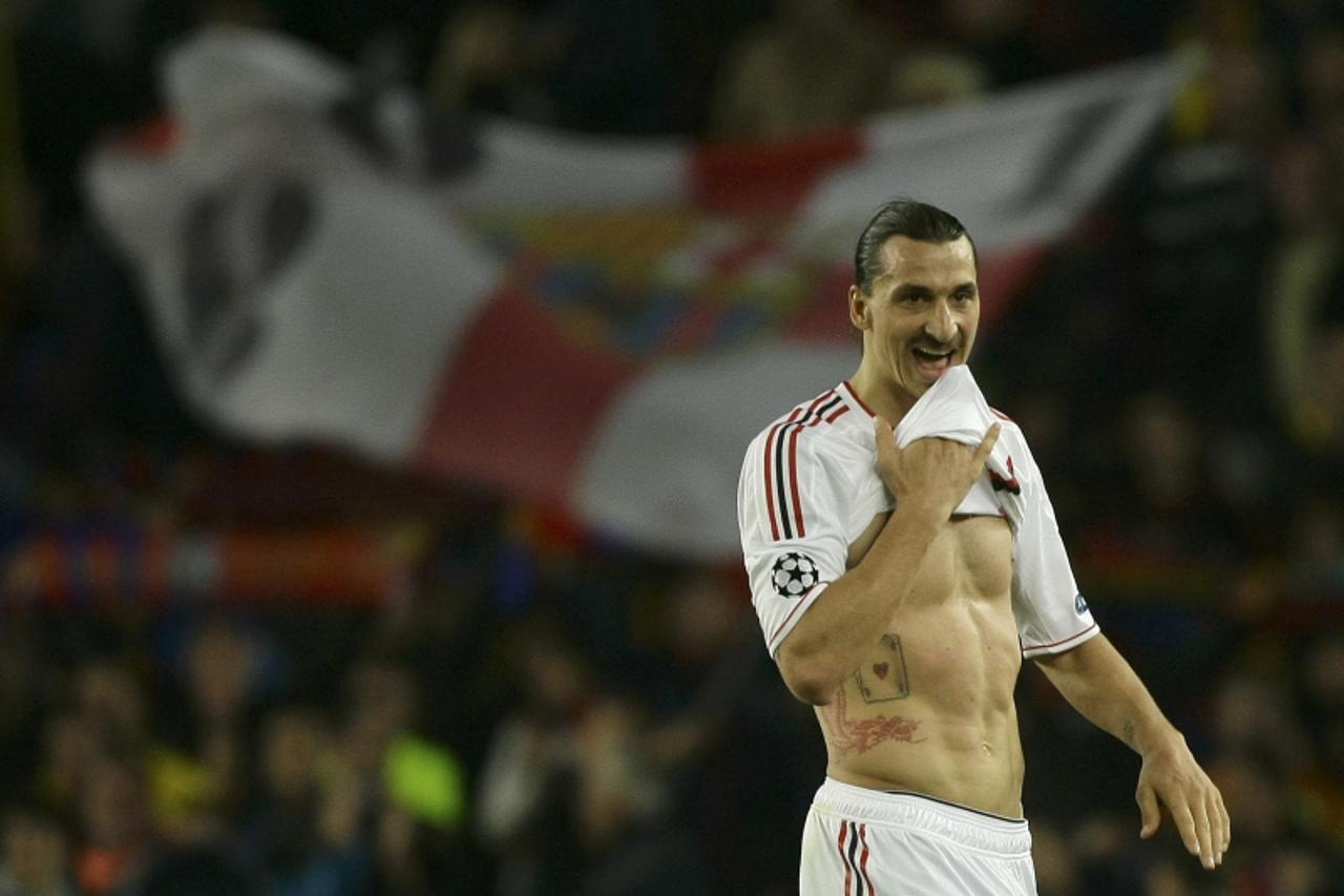 'AC Milan\'s Zlatan Ibrahimovic leaves the pitch after their Champions League quarter-final second leg soccer match against Barcelona at Camp Nou stadium in Barcelona April 3, 2012.  REUTERS/Gustau Na