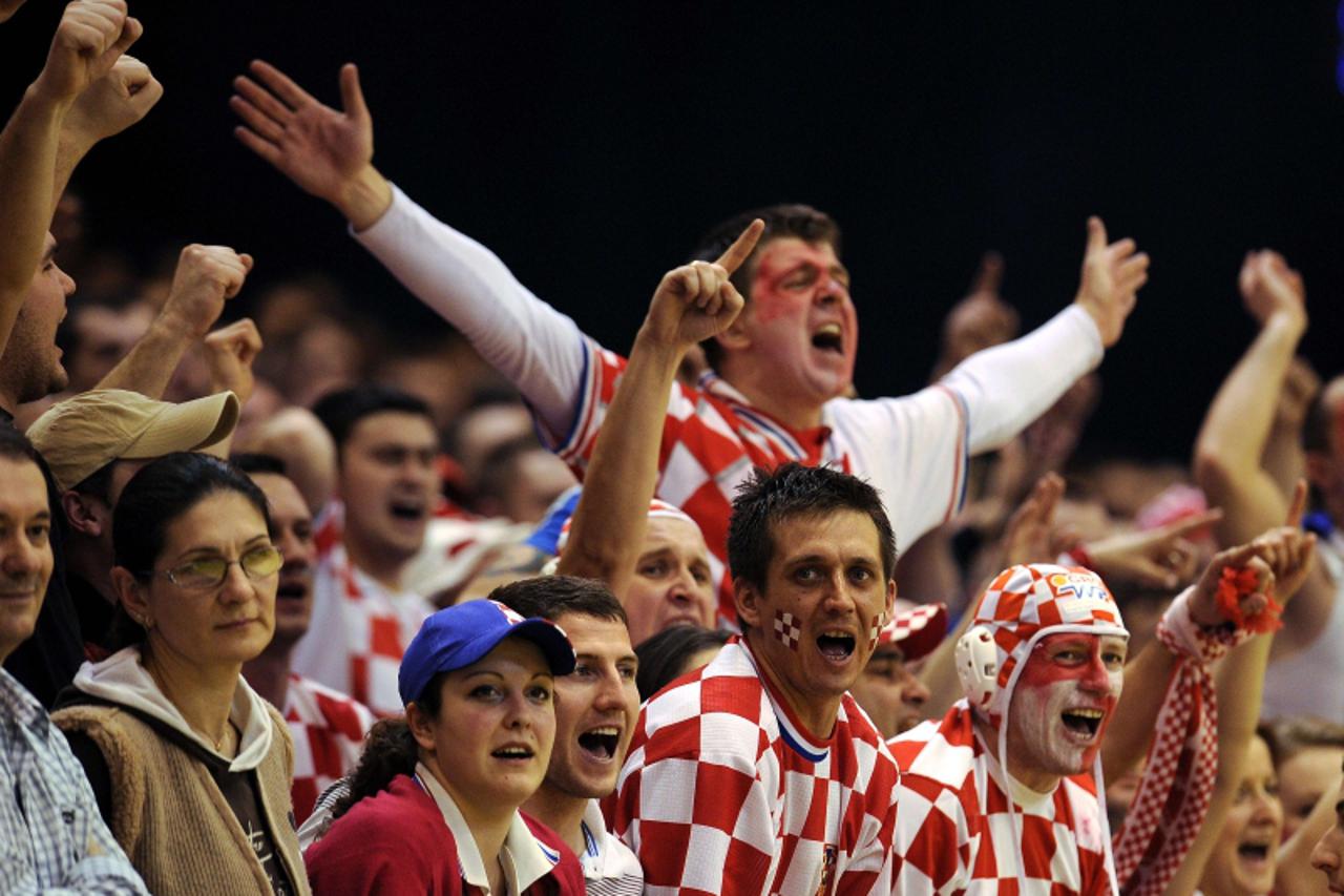 'Croatian supporters cheer on their team during the men\'s EHF Euro 2012 Handball Championship match between France and Croatia at the Spens Hall of Novi Sad on January 24, 2012.  Croatia won 29-22. A