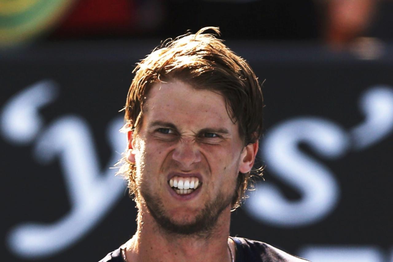 'Andreas Seppi of Italy celebrates defeating Marin Cilic of Croatia during their men\'s singles match at the Australian Open tennis tournament in Melbourne January 19, 2013. REUTERS/Damir Sagolj (AUST