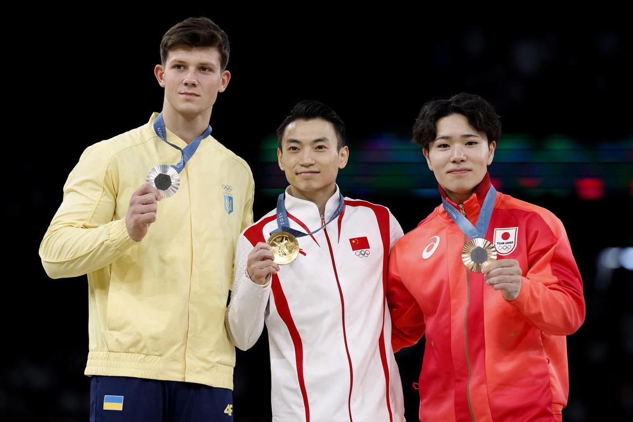 Artistic Gymnastics - Men's Parallel Bars Victory Ceremony