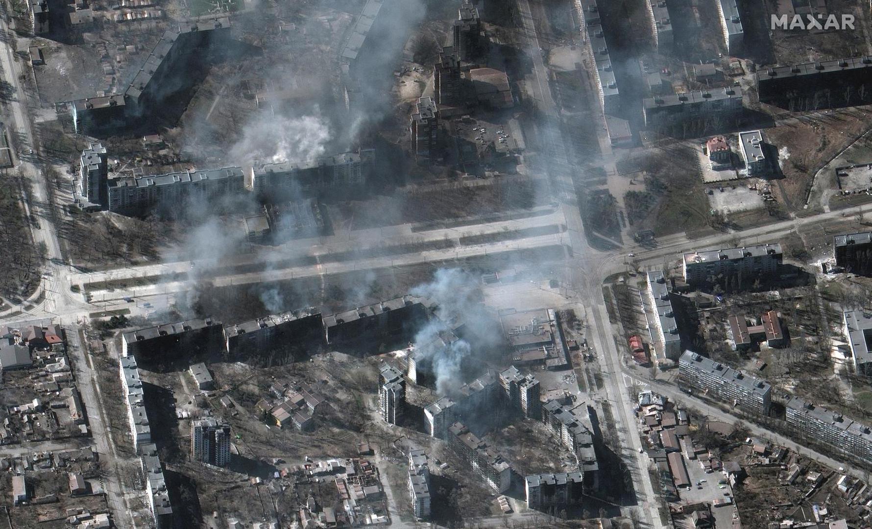 A satellite image shows buildings on fire, in Mariupol, Ukraine, March 22, 2022. Satellite image ©2022 Maxar Technologies/Handout via REUTERS ATTENTION EDITORS - THIS IMAGE HAS BEEN SUPPLIED BY A THIRD PARTY. MANDATORY CREDIT. NO RESALES. NO ARCHIVES. DO NOT OBSCURE LOGO. Photo: MAXAR TECHNOLOGIES/REUTERS