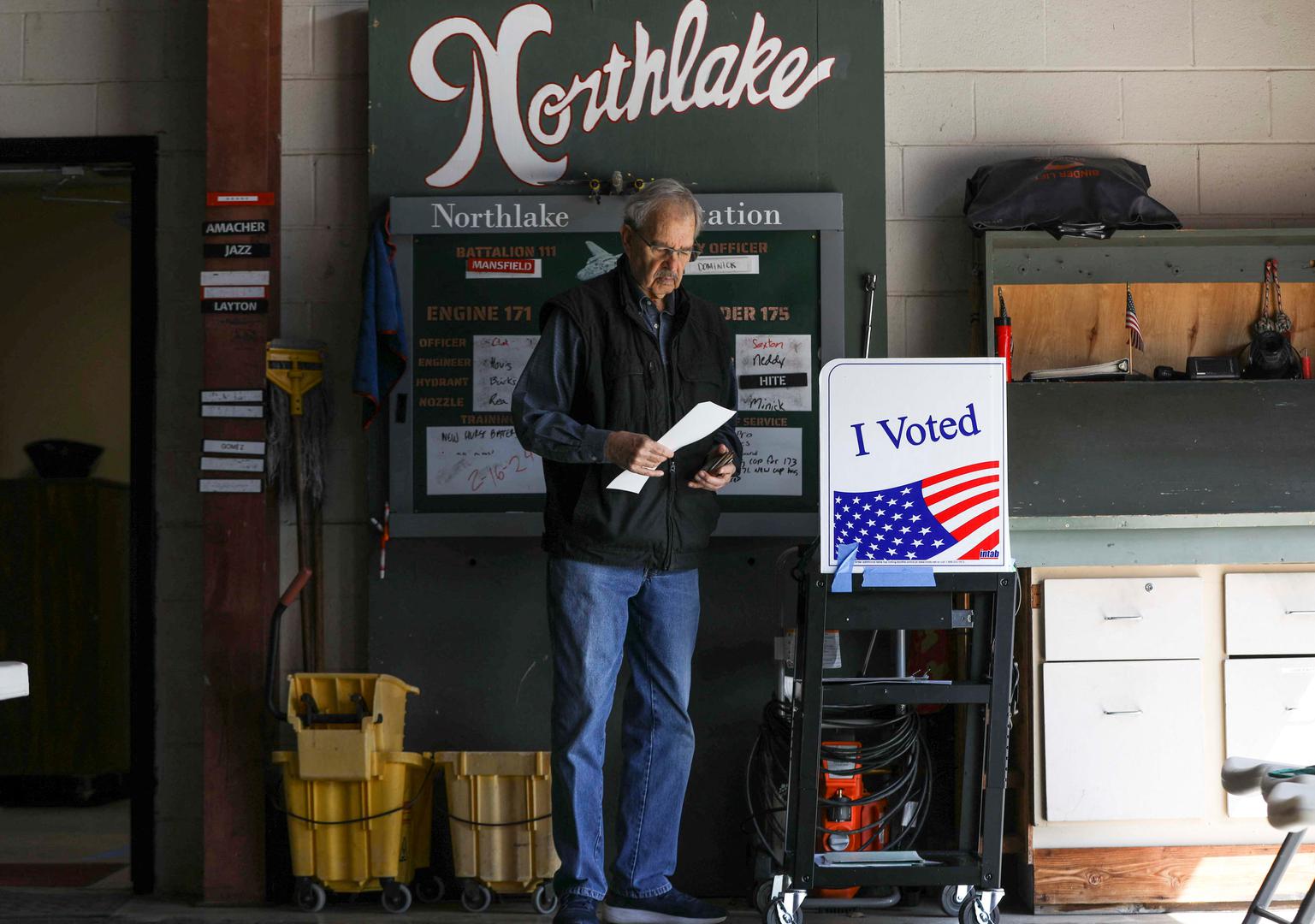 A person looks over their ballot at the Northlake Fire Station during the Republican presidential primary election on Election Day, in Irmo, South Carolina, U.S. February 24, 2024. REUTERS/Alyssa Pointer Photo: Alyssa Pointer/REUTERS