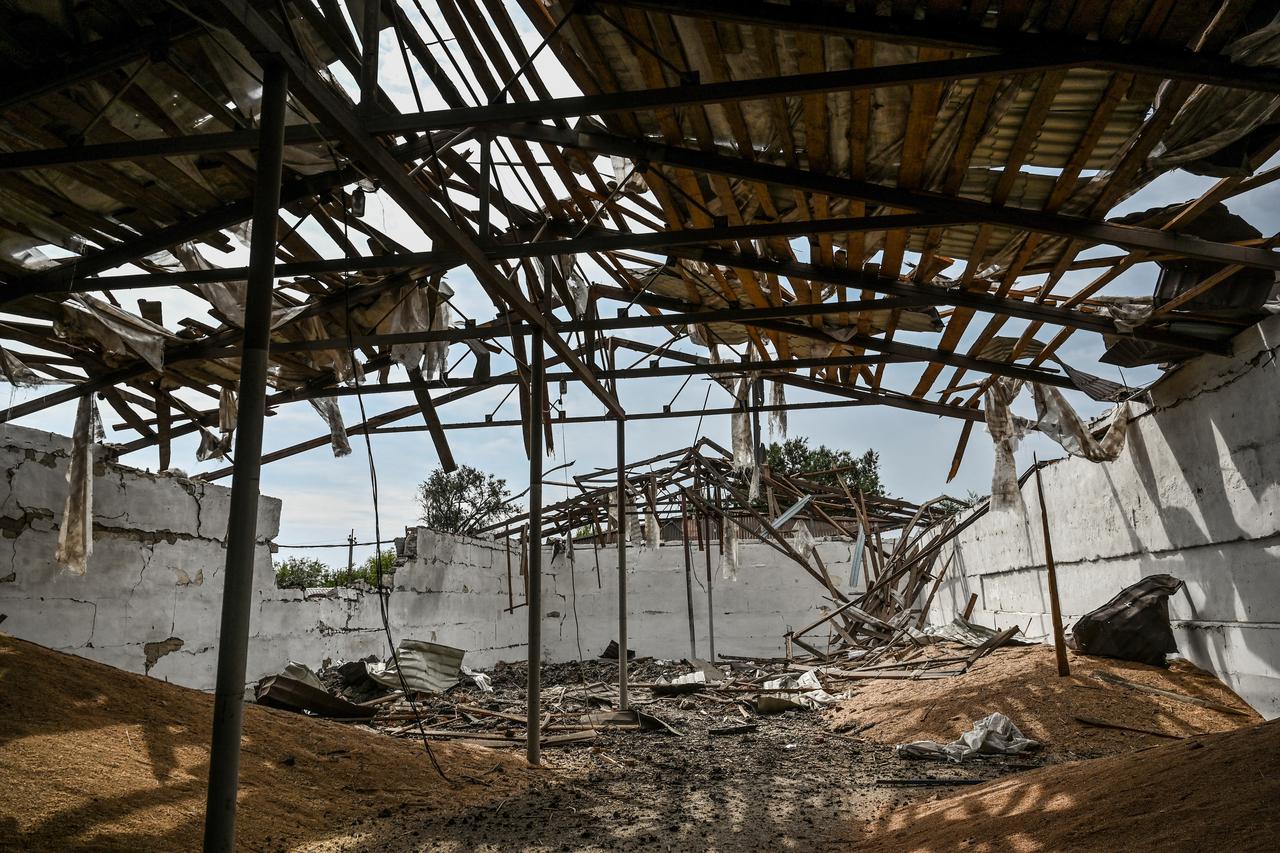 Wheat grains are seen inside a storage damaged by a Russian missile strike in Zaporizhzhia Region