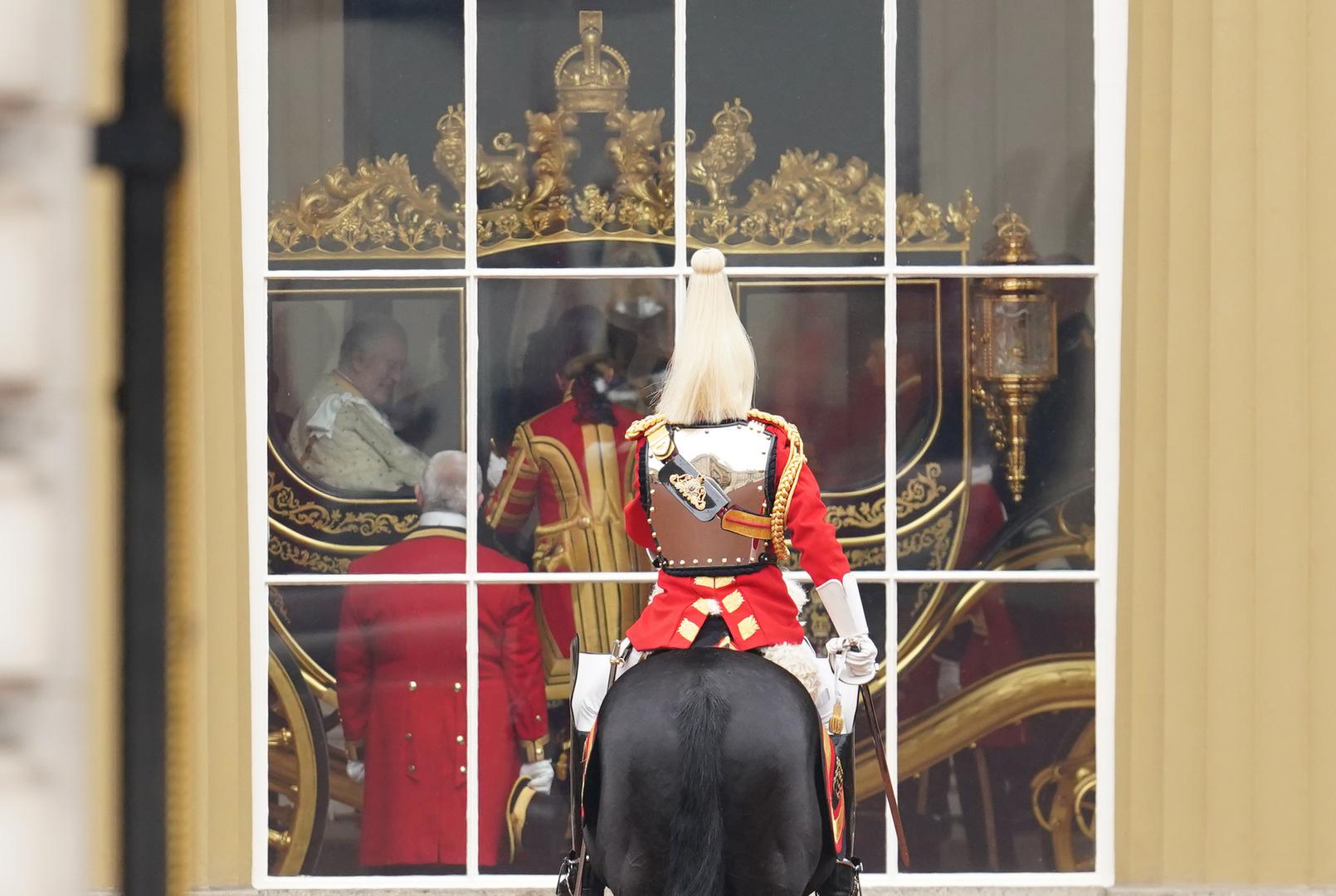 King Charles III in the Diamond Jubilee State Coach at Buckingham Palace ahead of the coronation ceremony London. Picture date: Saturday May 6, 2023. Photo: Owen Humphreys/PRESS ASSOCIATION