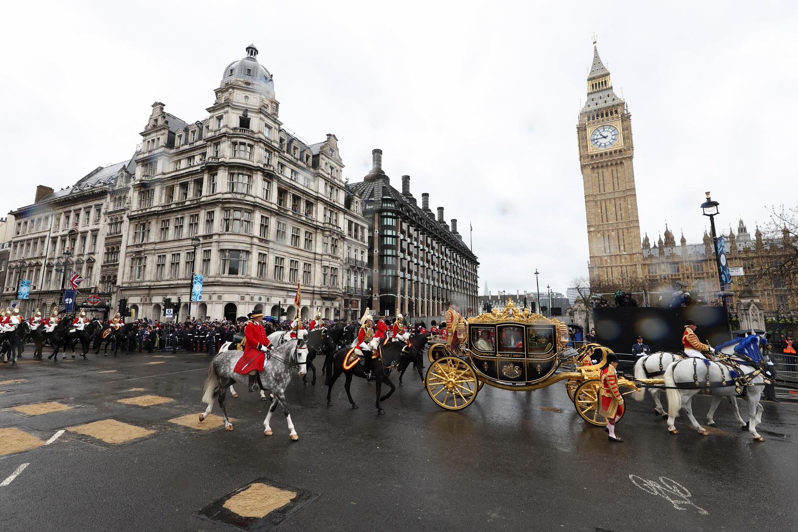 Britain's King Charles and Queen Camilla sit in Diamond Jubilee State Coach in front of Big Ben in Westminster on the day of coronation in London, Britain May 6, 2023. REUTERS/Marko Djurica Photo: MARKO DJURICA/REUTERS