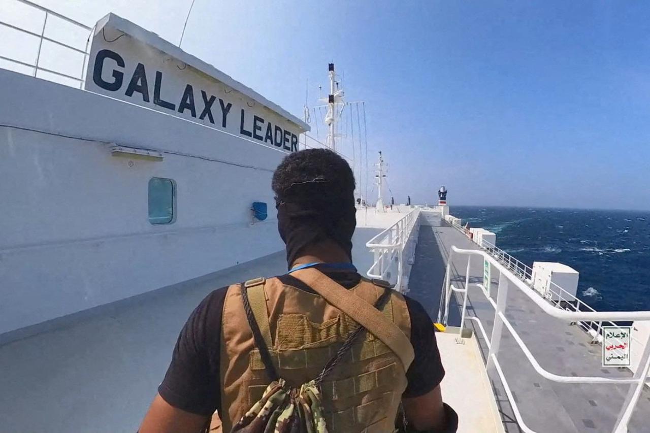 FILE PHOTO: Houthi fighter stands on the Galaxy Leader cargo ship in the Red Sea