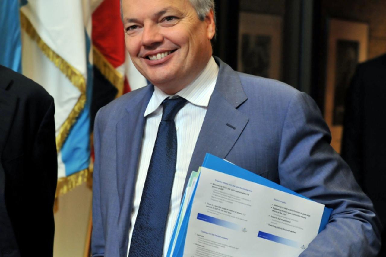 'Belgium Finance Minister Didier Reynders leaves after an ECOFIN meeting on November 17, 2010 at the EU headquarters in Brussels.  Europe inches towards its second bailout in six months of a eurozone 