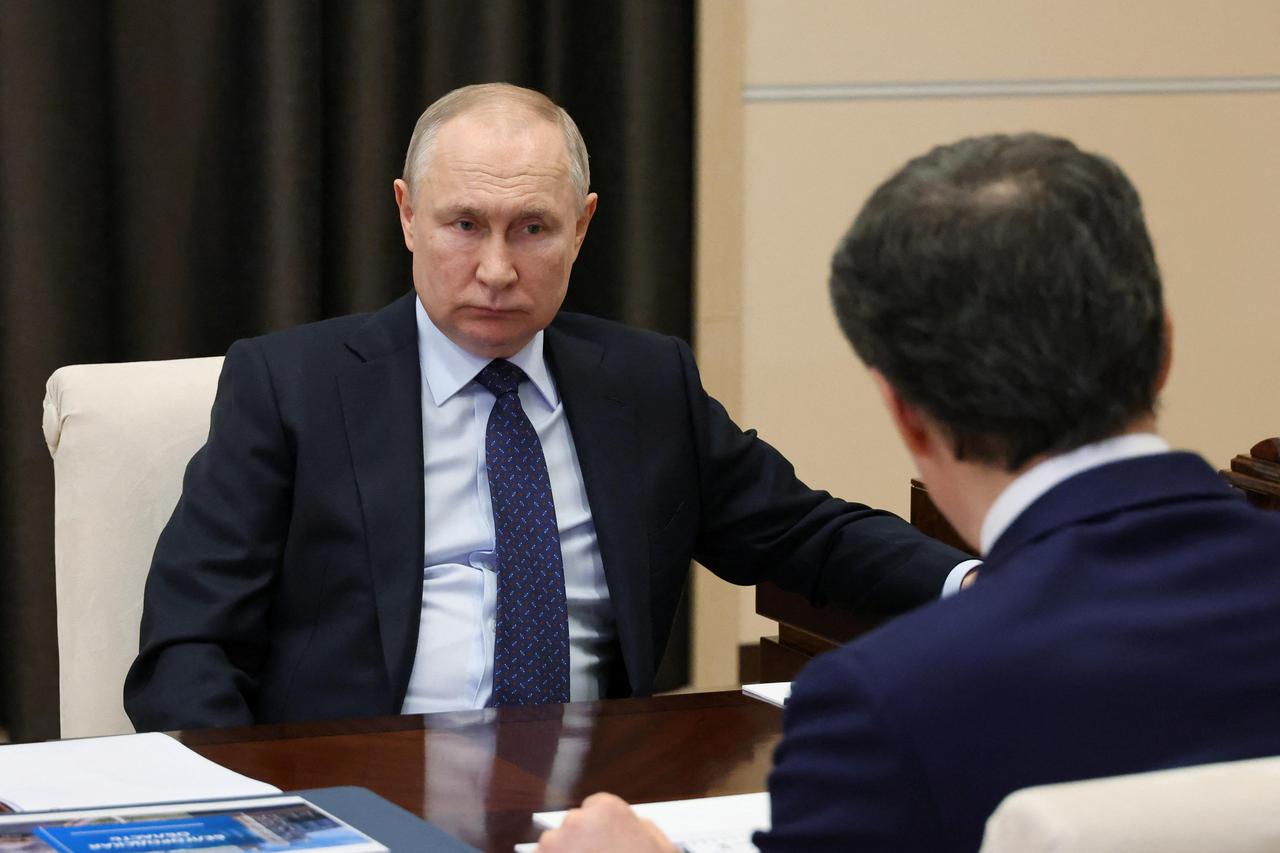 Russian President Vladimir Putin meets with Belgorod region governor Vyacheslav Gladkov, outside Moscow