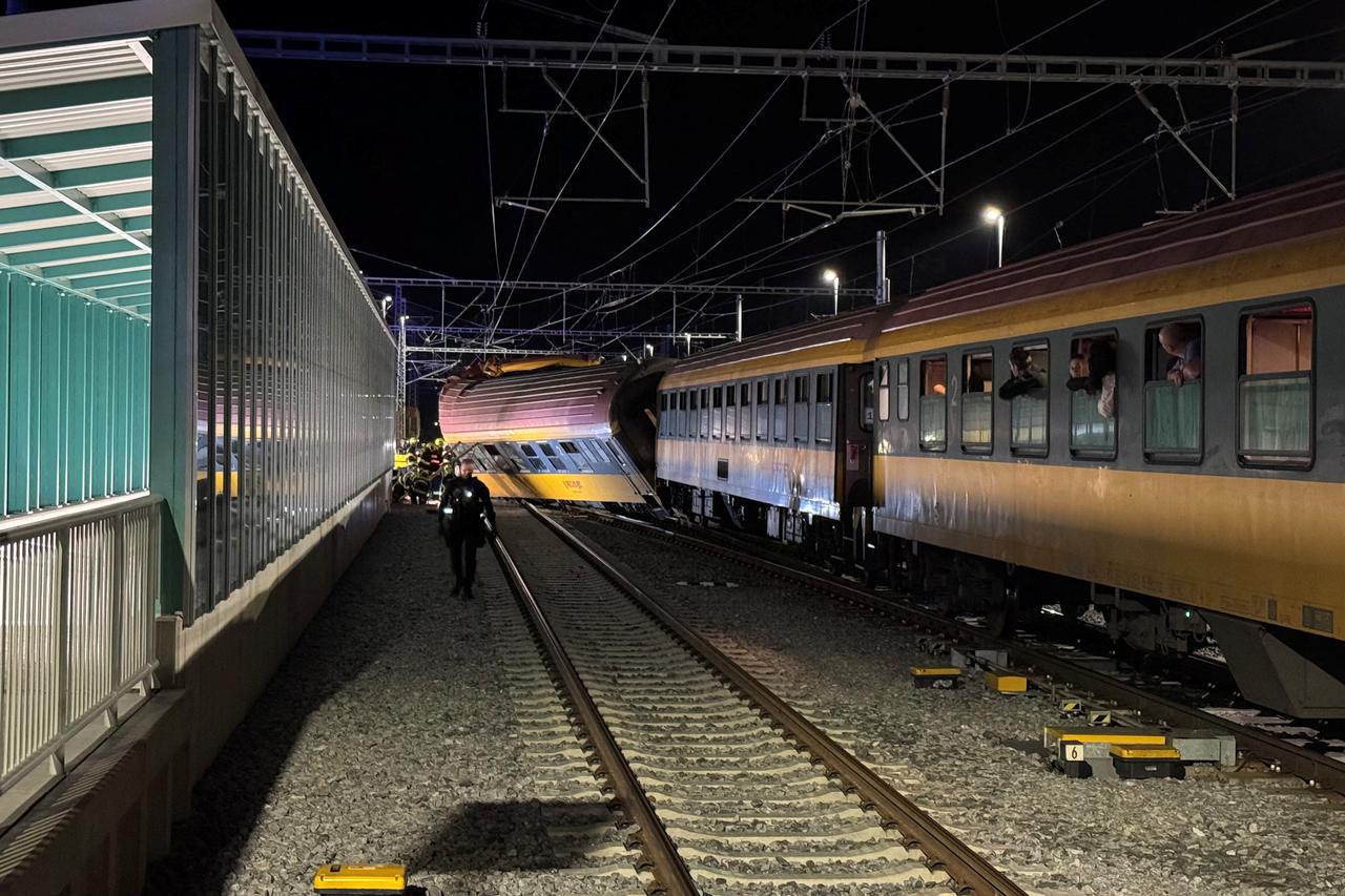 A view of a derailed train carriage following a collision between a passenger train and a freight train in Pardubice