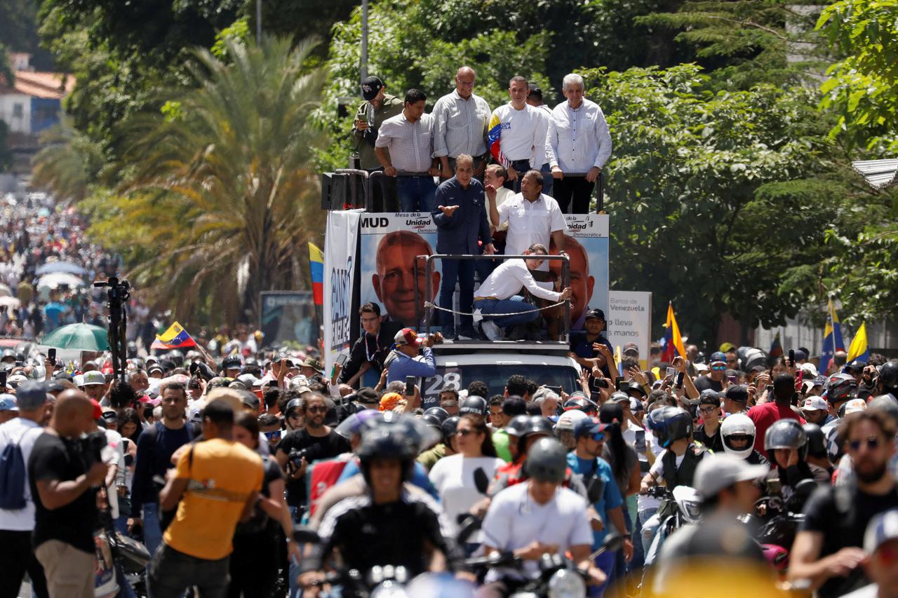 FILE PHOTO: Venezuela's opposition leaders call for a march to defend democracy, in Caracas