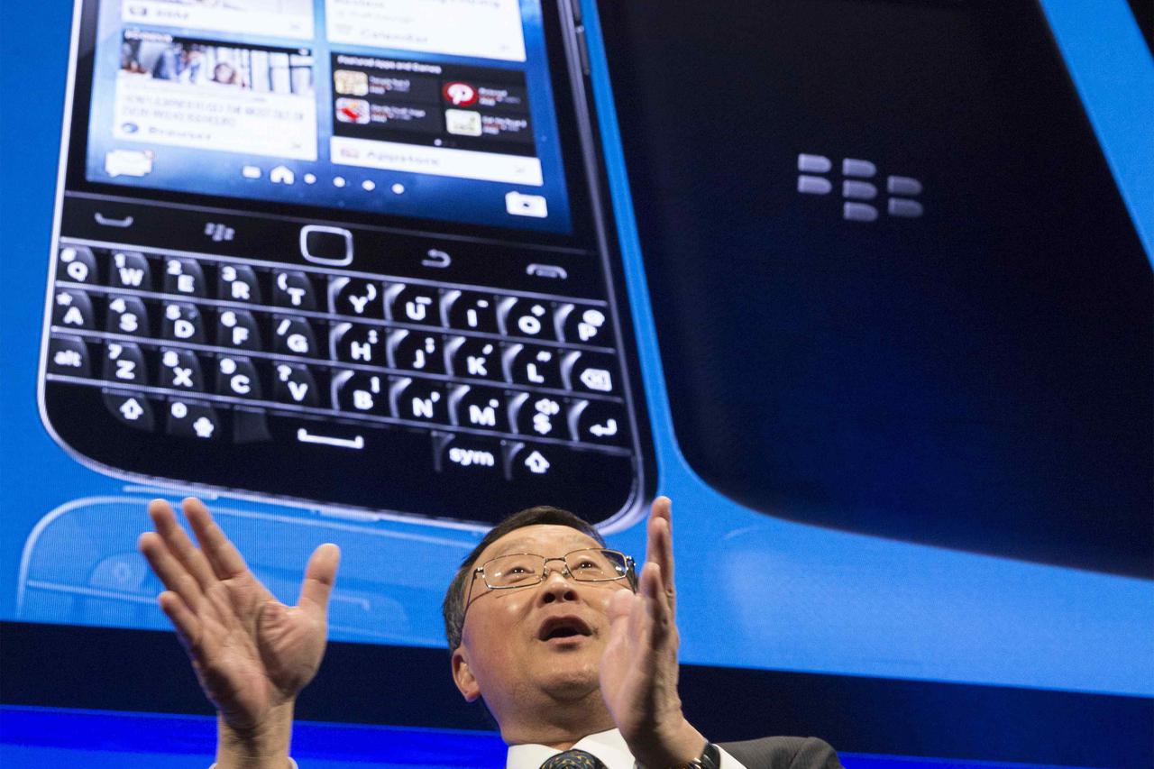 BlackBerry Chief Executive John Chen answers questions during the launch event for the new Blackberry Classic smartphone  in New York, December 17, 2014.  REUTERS/Brendan McDermid (UNITED STATES - Tags: BUSINESS SCIENCE TECHNOLOGY TELECOMS)