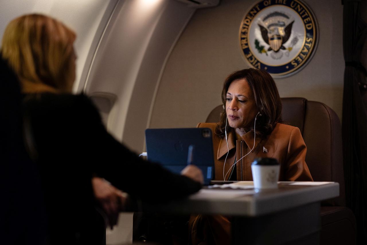 Democratic presidential nominee U.S. Vice President Kamala Harris works aboard Air Force Two