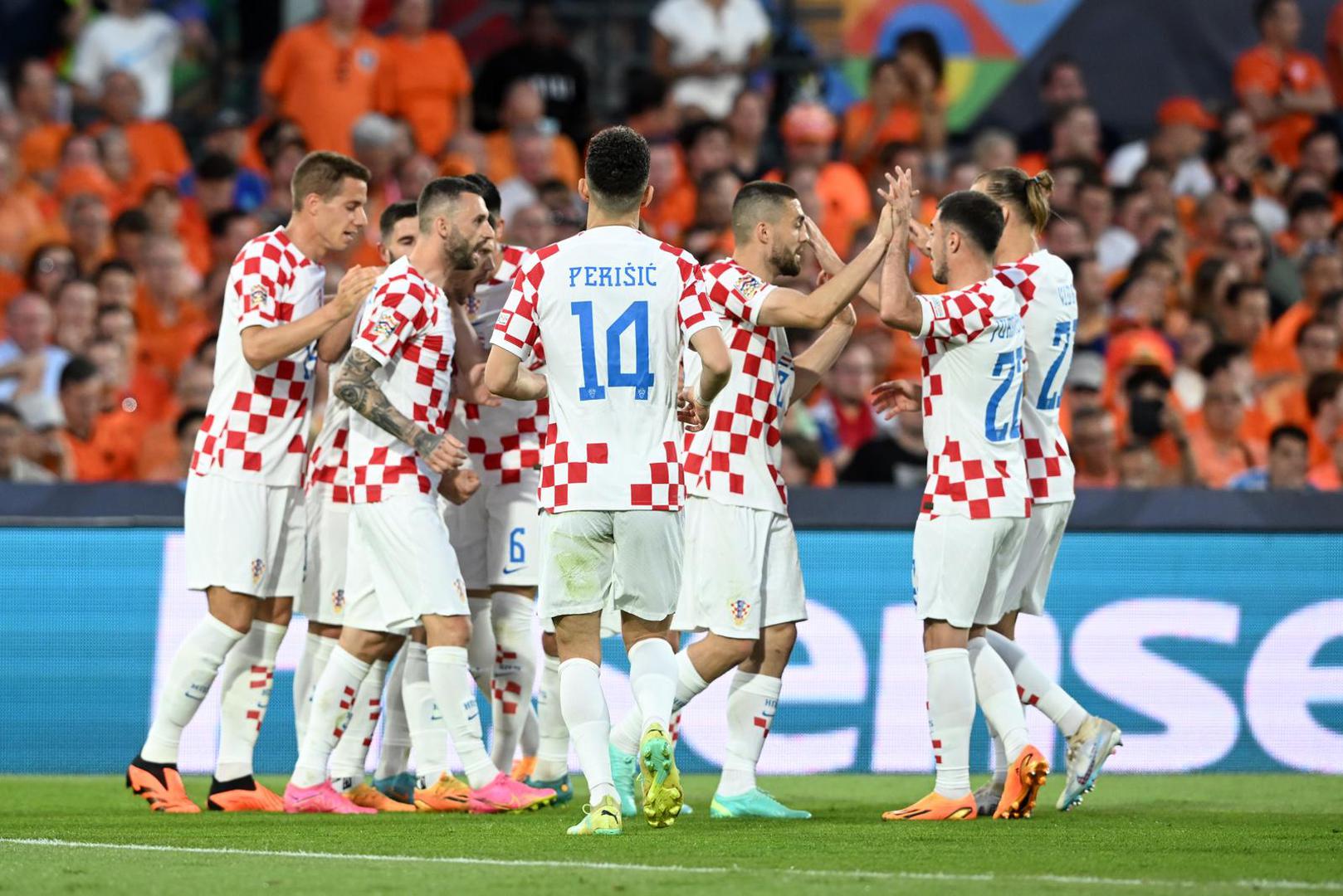 14.06.2023., stadion Feyenoord "De Kuip", Rotterdam, Nizozemska - UEFA Liga Nacija, polufinale, Nizozemska - Hrvatska. Hrvatski nogometasi slave pogodak za 1:1 Photo: Marko Lukunic/PIXSELL