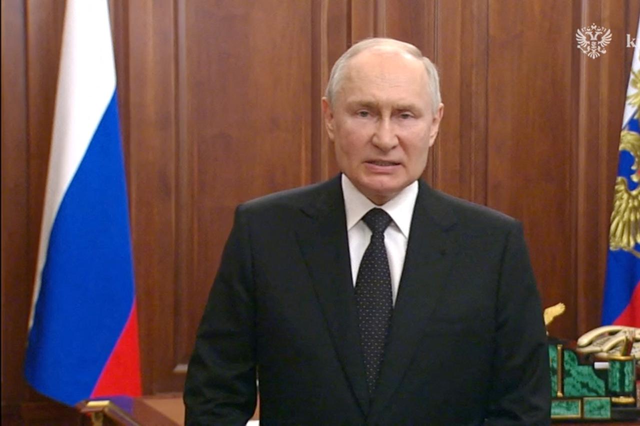 Russian President Vladimir Putin gives a televised address in Moscow