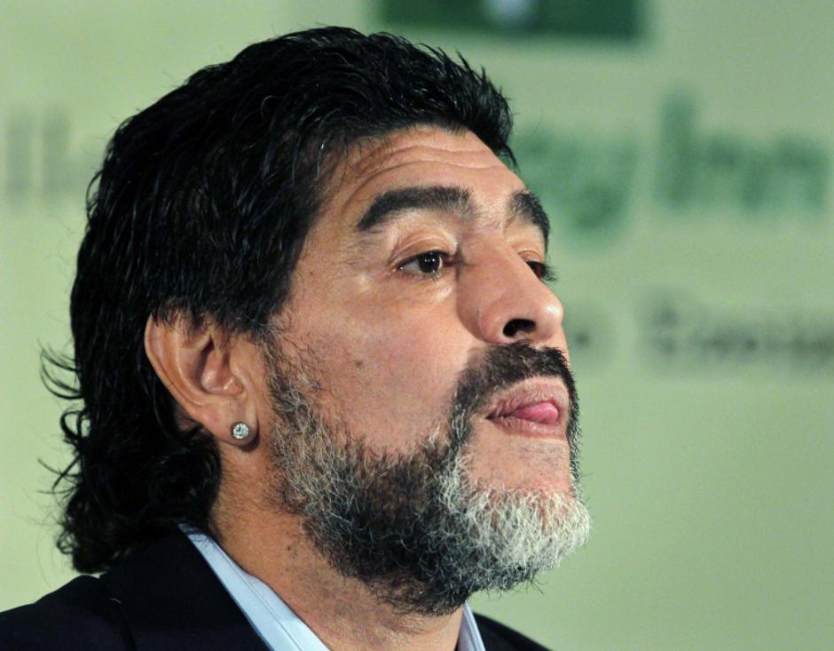 'Argentina soccer great Diego Maradona arrives to read a statement in Buenos Aires in this July 28, 2010 file photo. Maradona was named head coach of Dubai's Al Wasl Sport Club on May 16, 2011, in a 