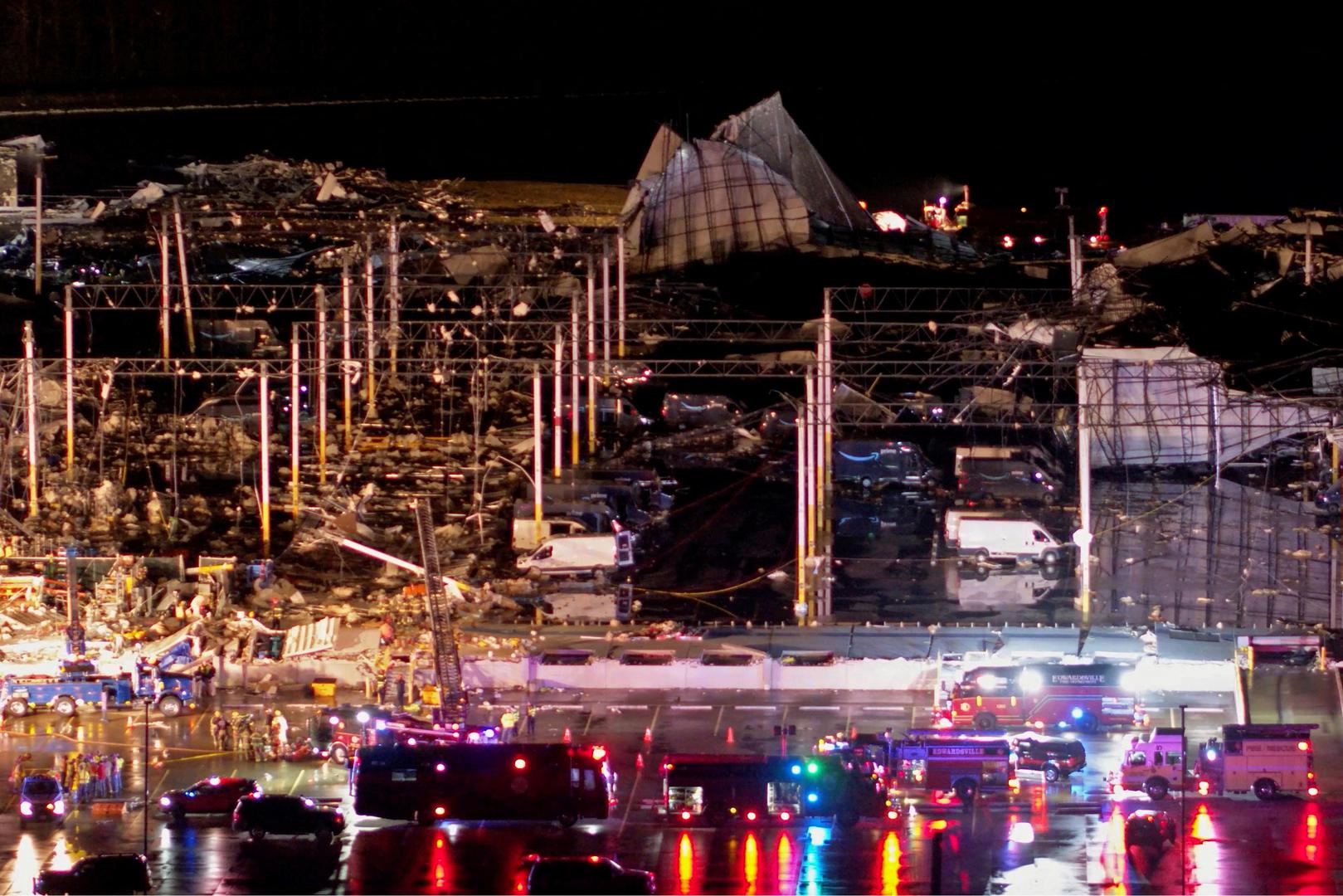 Emergency crews respond to a collapsed Amazon.com warehouse after a tornado passed through Edwardsville, Illinois, U.S., December 10, 2021 in a still image taken from drone video obtained on December 11, 2021. Chris Phillips/Maverick Media Group, LLC via REUTERS  THIS IMAGE HAS BEEN SUPPLIED BY A THIRD PARTY. MANDATORY CREDIT