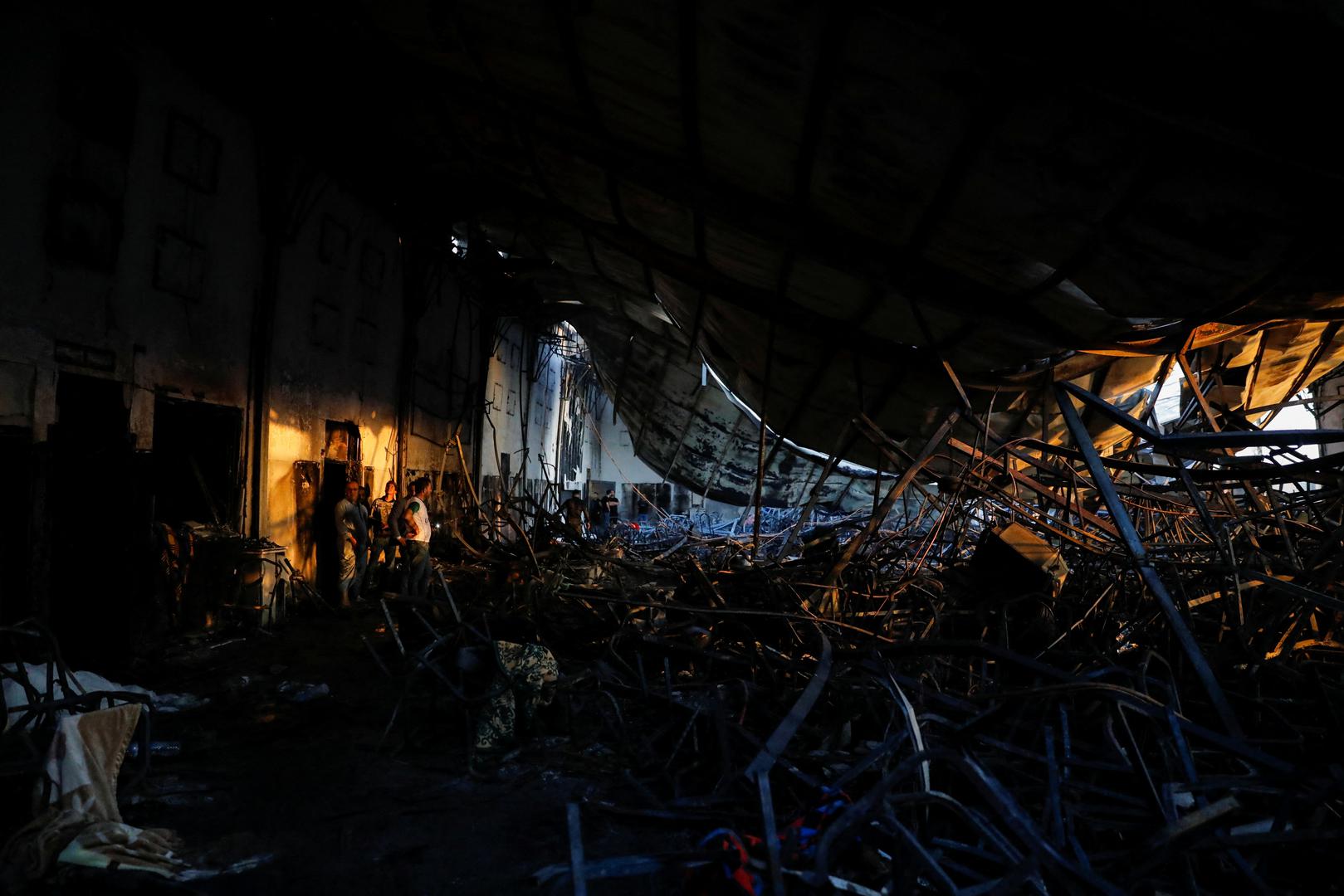 People gather at the site following a fatal fire at a wedding celebration, in the district of Hamdaniya in Iraq's Nineveh province, Iraq, September 27, 2023. REUTERS/Abdullah Rashid Photo: ABDULLAH RASHID/REUTERS