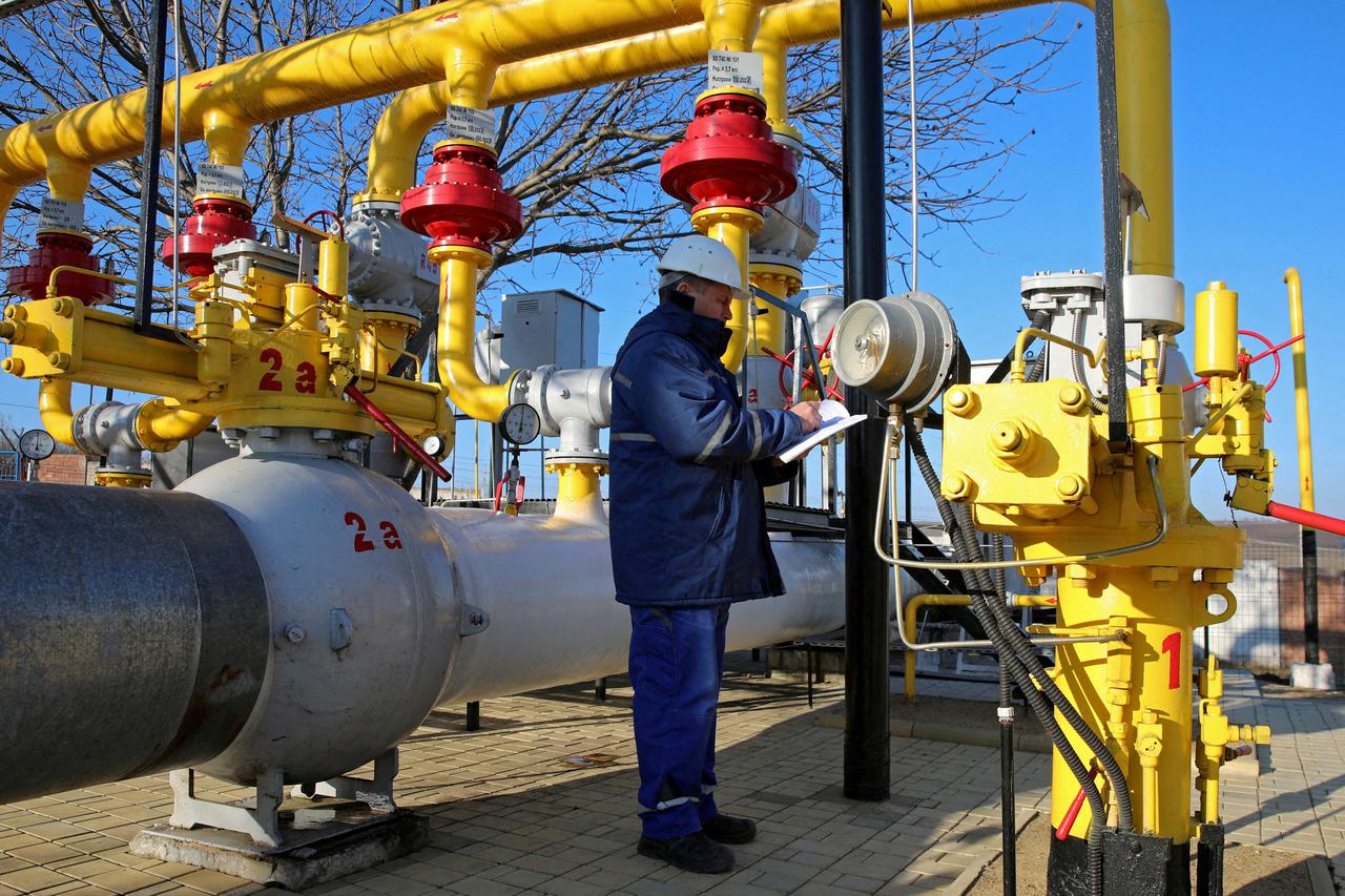 FILE PHOTO: An employee works at a gas distribution plant in Chisinau