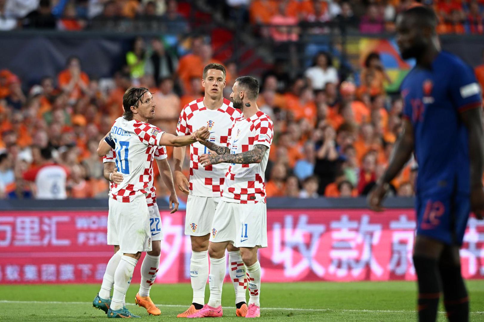 14.06.2023., stadion Feyenoord "De Kuip", Rotterdam, Nizozemska - UEFA Liga Nacija, polufinale, Nizozemska - Hrvatska. Hrvatski nogometasi slave pogodak za 1:1 Photo: Marko Lukunic/PIXSELL