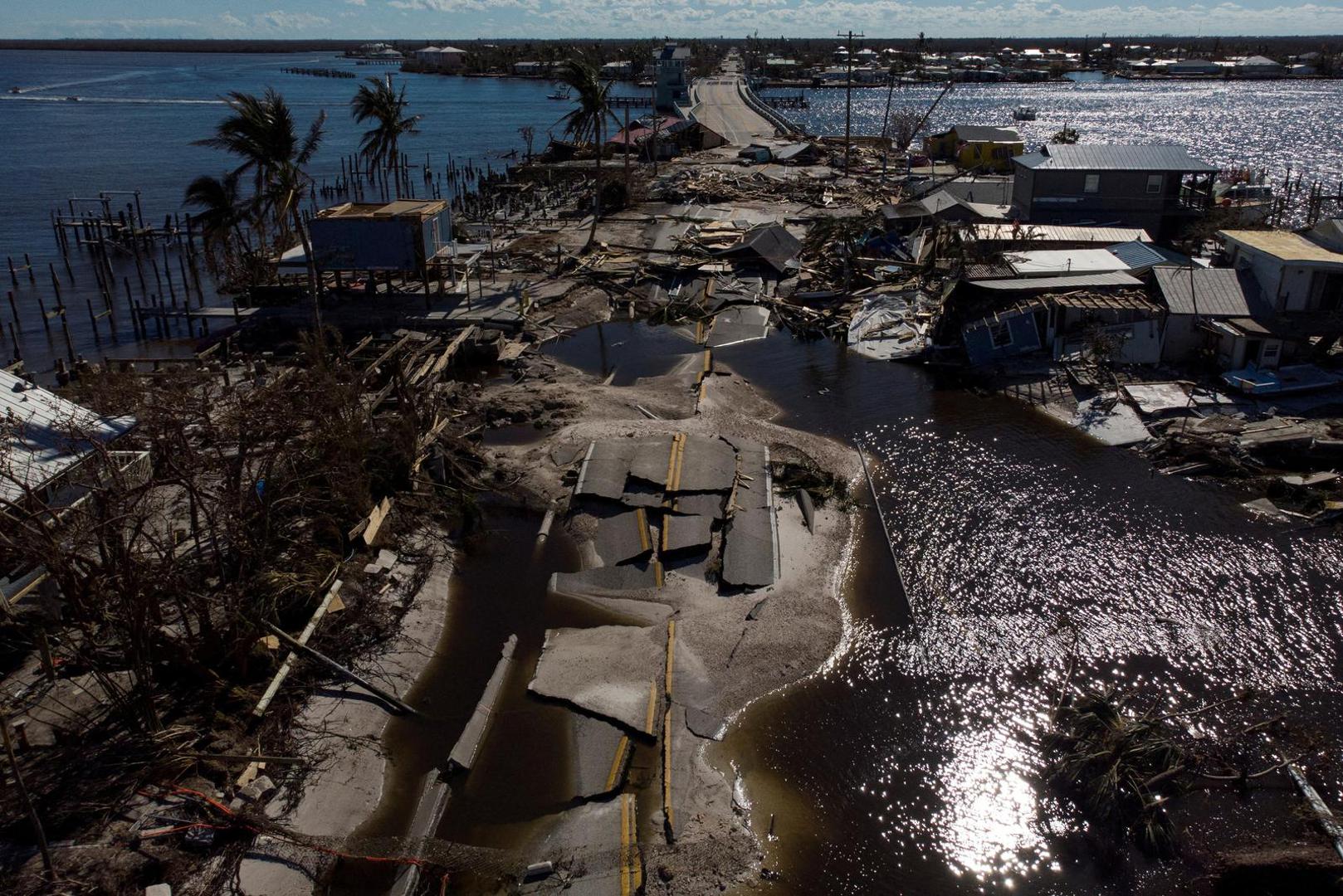 FILE PHOTO: A view of the destroyed road between Matlacha and Pine Island after Hurricane Ian caused widespread destruction in Matlacha, Florida, U.S., October 2, 2022. REUTERS/Marco Bello/File Photo Photo: MARCO BELLO/REUTERS