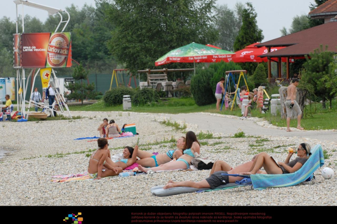 '05.08.2010., Aquacity, Varazdin - Ove godine gradsko kupaliste Aquacity nije dobilo plavu zastavu, ali  gradjani vjeruju da je voda cista jer u njoj zive rijecni rakovi.  Photo: Marko Jurinec/PIXSELL