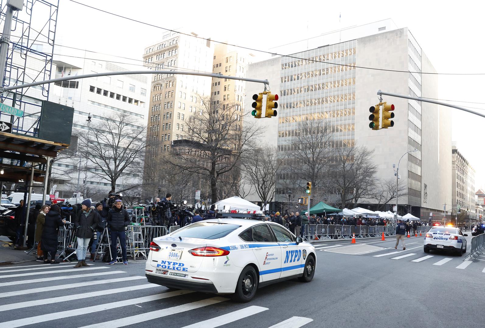 Media stand behind police barricades outside New York Criminal Court at 100 Centre Street awaiting the arrival and the arraignment of Former President Donald Trump after a grand jury indictment in New York City on Tuesday, April 4, 2023. Donald Trump was indicted Thursday by a Manhattan grand jury on more than 30 counts related to business fraud. Manhattan District Attorney Alvin Bragg has been investigating the former president in connection with his alleged role in a hush money payment scheme and cover-up involving adult film star Stormy Daniels. Photo by John Angelillo/UPI Photo via Newscom Photo: John Angelillo/NEWSCOM