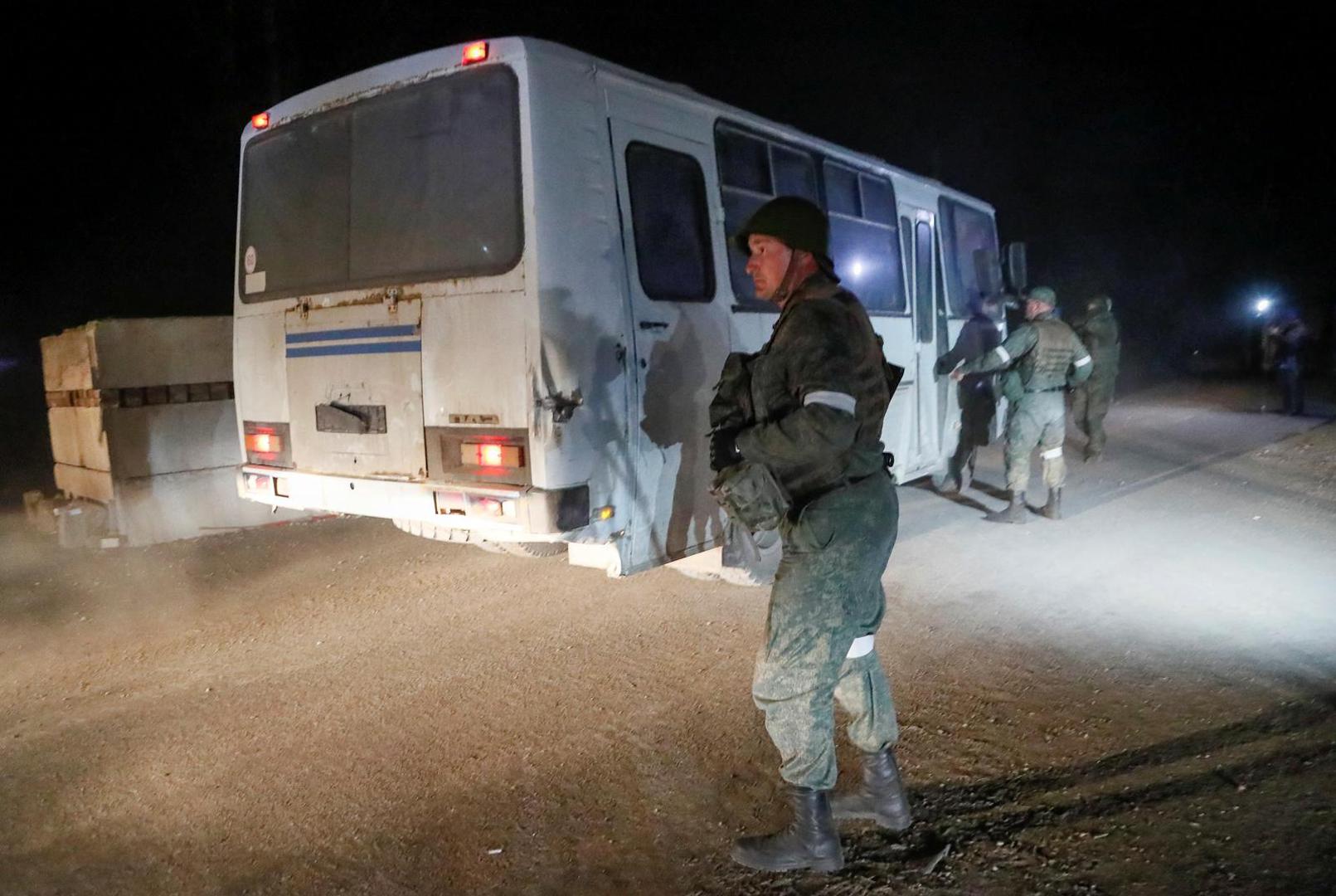 A bus carrying service members of Ukrainian forces from the besieged Azovstal steel mill drives away under escort of the pro-Russian military in the course of Ukraine-Russia conflict in Mariupol, Ukraine May 16, 2022. REUTERS/Alexander Ermochenko Photo: Alexander Ermochenko/REUTERS