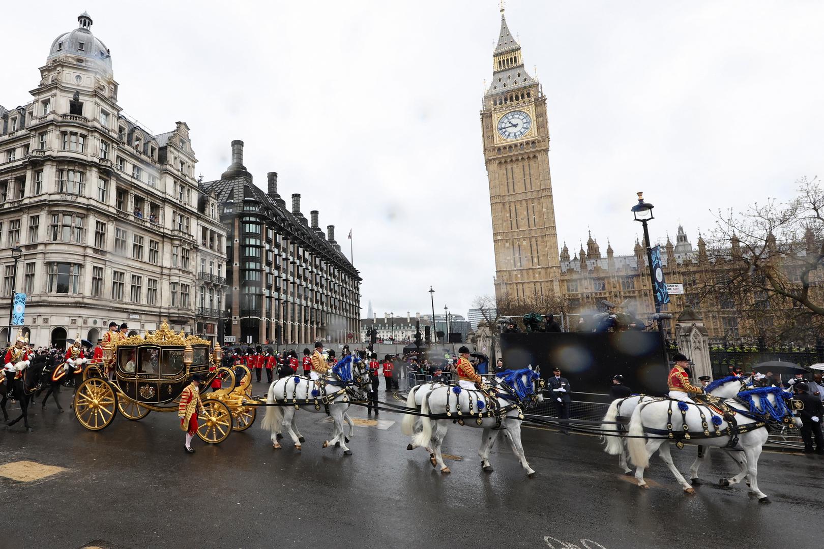 Britain's King Charles and Queen Camilla sit in Diamond Jubilee State Coach in front of Big Ben in Westminster on the day of coronation in London, Britain May 6, 2023. REUTERS/Marko Djurica Photo: MARKO DJURICA/REUTERS