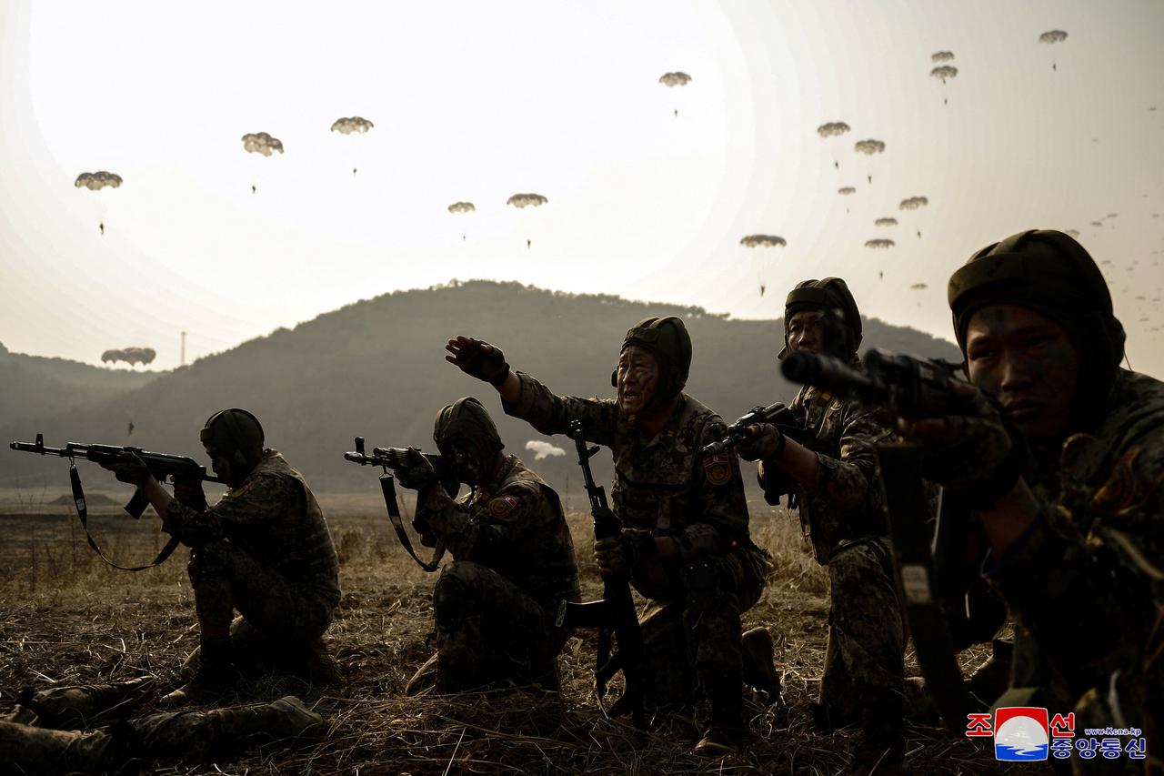 North Korean leader Kim Jong Un guides the training of the Korean People's Army's air and amphibious combat units