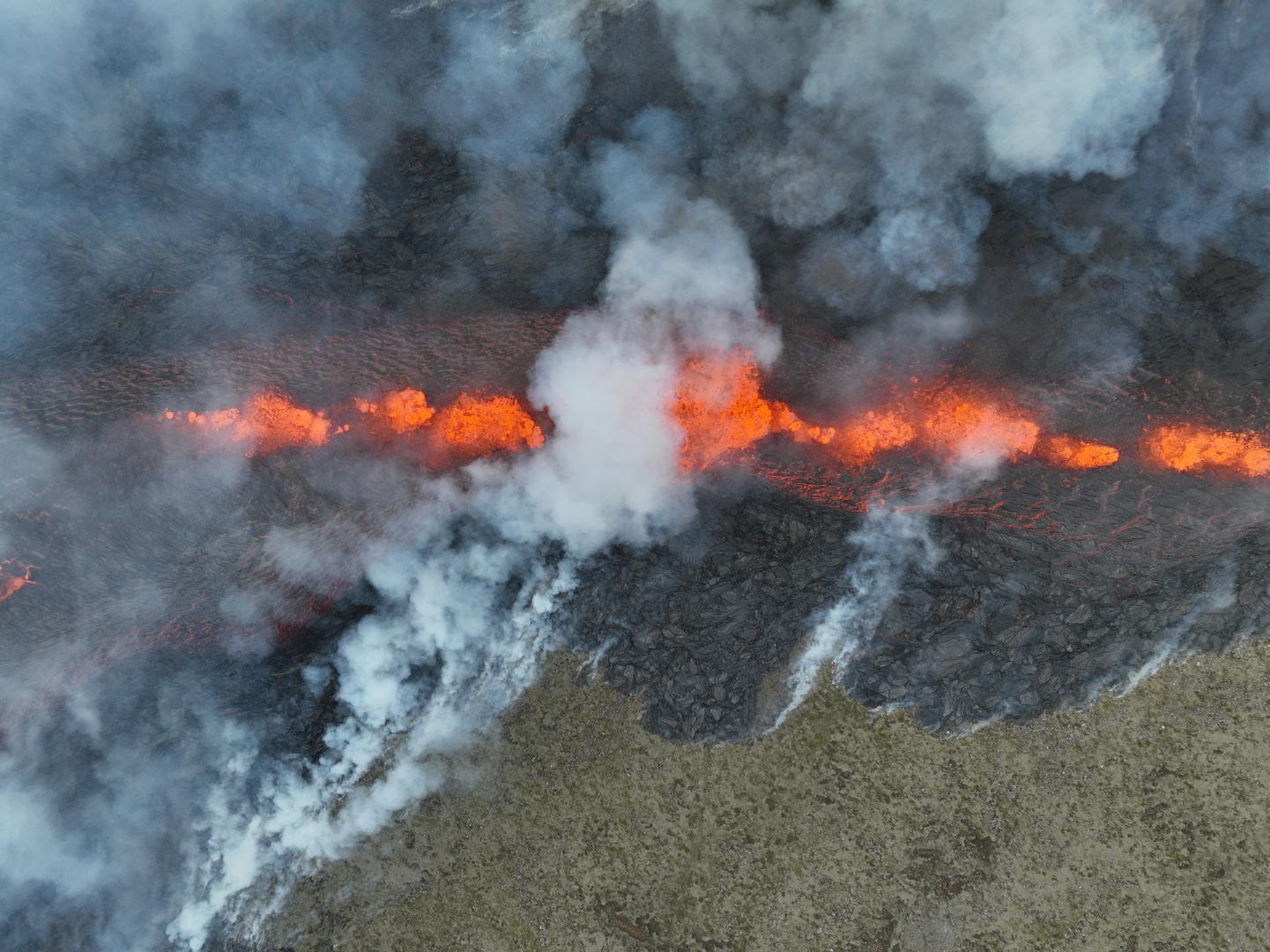 Smoke billows and lava flows after the eruption of a volcano, on the Reykjanes peninsula, near the capital Reykjavik, in southwest Iceland, July 10, 2023, in this picture obtained from social media. Juergen Merz - Glacier Photo Artist/via REUTERS  THIS IMAGE HAS BEEN SUPPLIED BY A THIRD PARTY. MANDATORY CREDIT. NO RESALES. NO ARCHIVES. Photo: JUERGEN MERZ - GLACIER PHOTO ART/REUTERS