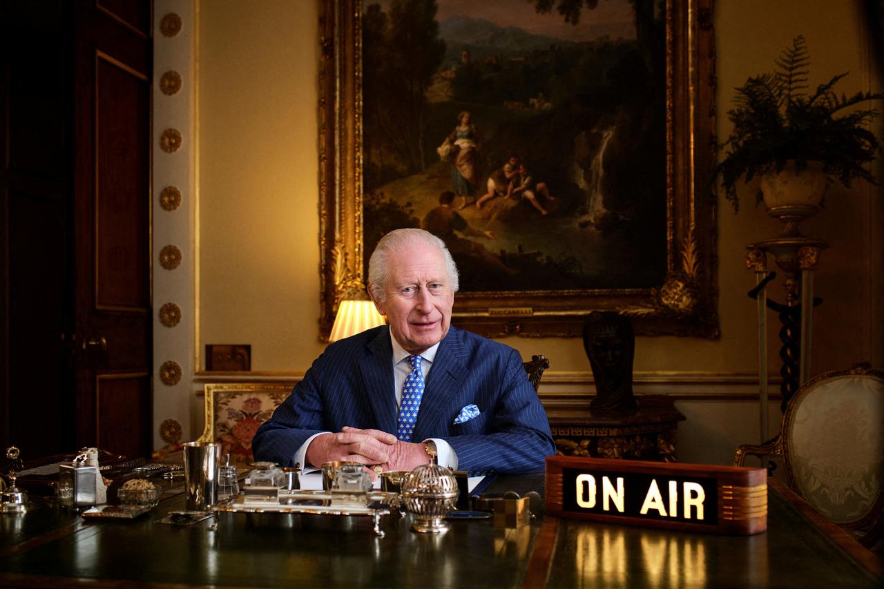 Britain's King Charles poses in his office where "The King's Music Room" recording takes place in Buckingham Palace, London