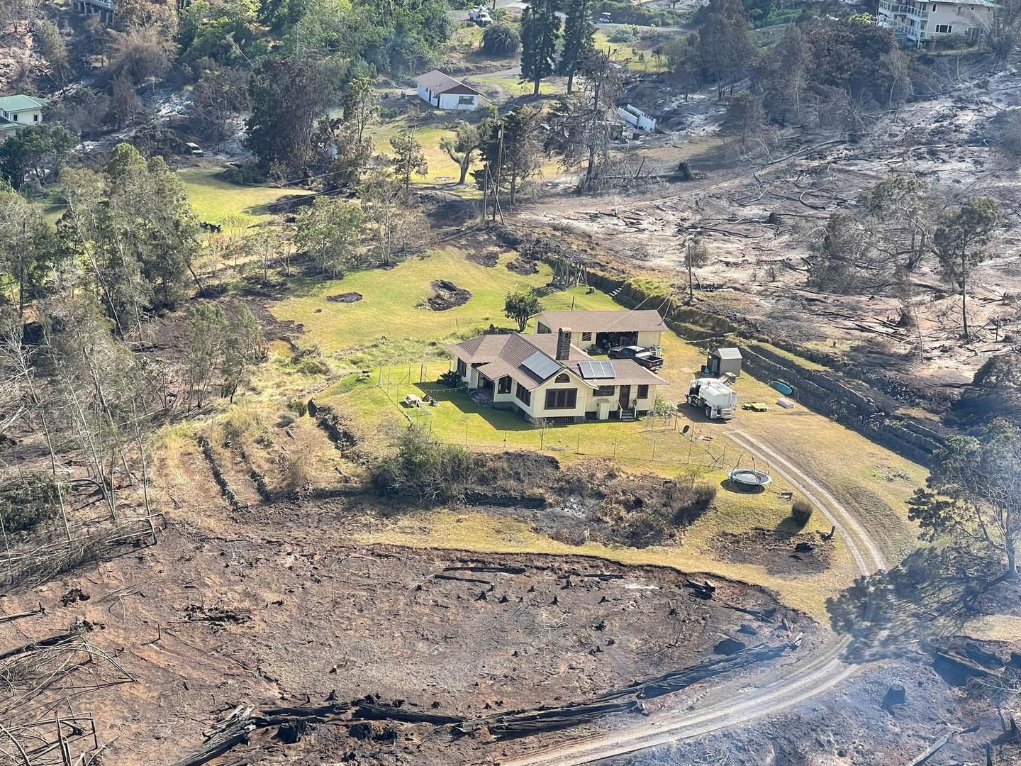 A house stands surrounded by scorched vegetation after wildfires driven by high winds burned across Kula on the island of Maui, Hawaii, U.S. August 11, 2023. Hawai'i Department of Land and Natural Resources/Handout via REUTERS  THIS IMAGE HAS BEEN SUPPLIED BY A THIRD PARTY. Photo: HAWAI'I DLNR/REUTERS