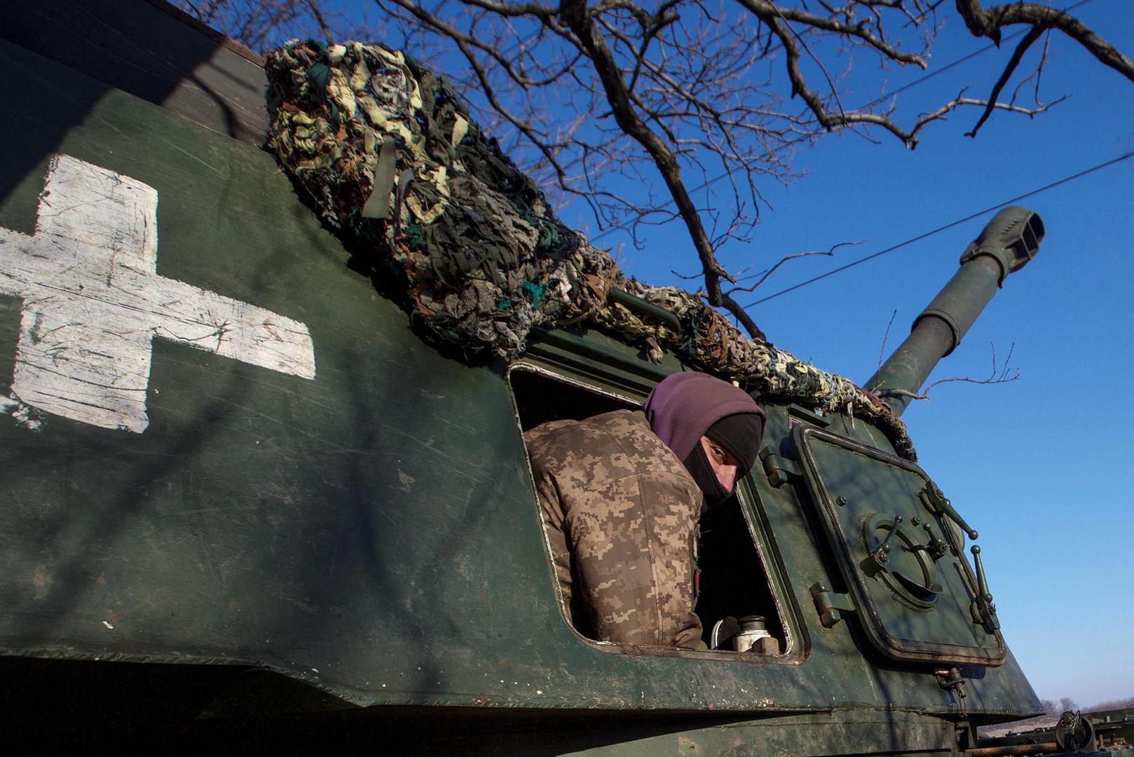 A Ukrainian serviceman is seen inside a 2S3 Akatsiya self-propelled howitzer at a position in a frontline, amid Russia's attack on Ukraine, in Donetsk region, Ukraine January 8, 2023. REUTERS/Anna Kudriavtseva Photo: Stringer/REUTERS