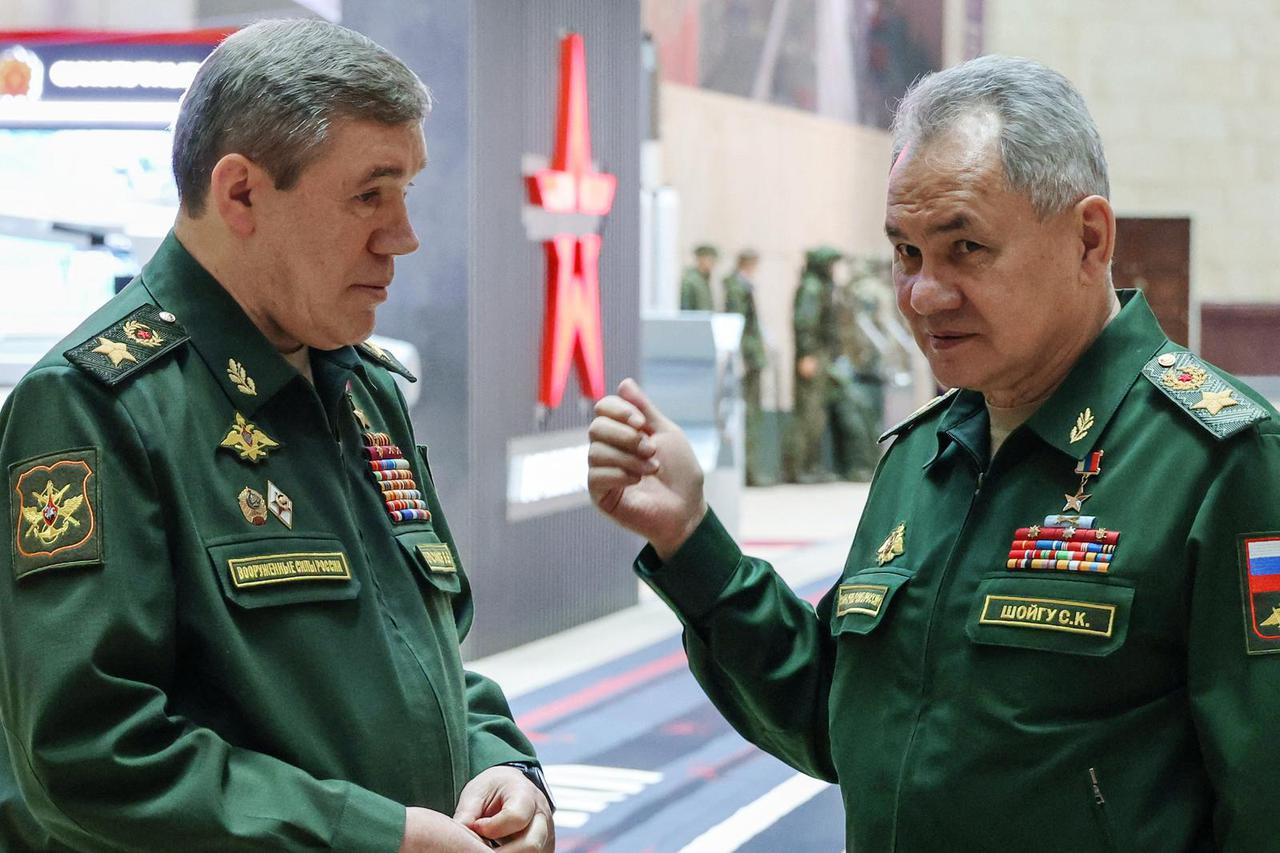 Russian Defence Minister Sergei Shoigu and Chief of the General Staff of Russian Armed Forces Valery Gerasimov attend an expanded meeting of the Defence Ministry Board in Moscow
