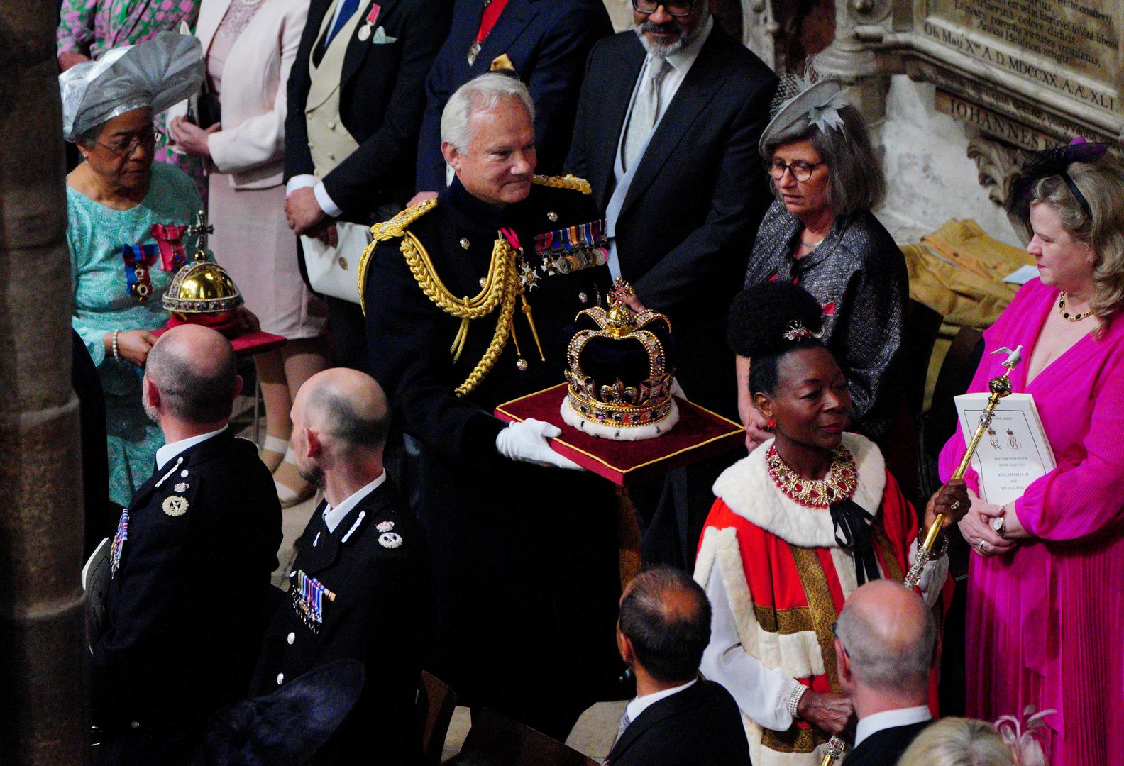 (right to left) Baroness Floella Benjamin, carrying the The Sovereign’s Sceptre with the Dove, General Sir Gordon Messenger, the Governor of HM Tower of London, carrying St Edward’s Crown as Lord High Steward of England, and Dame Elizabeth Anionwu, carrying The Sovereign’s Orb, at the coronation of King Charles III and Queen Camilla at Westminster Abbey, London. Picture date: Saturday May 6, 2023. Photo: Ben Birchall/PRESS ASSOCIATION