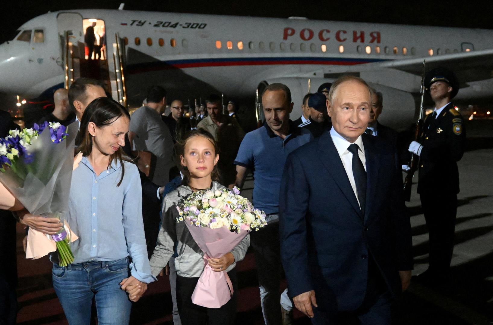 FILE PHOTO: Russian President Vladimir Putin welcomes Russian nationals, including Artyom Dultsev, Anna Dultseva and their children, following a prisoner exchange between Russia with Western countries, during a ceremony at Vnukovo International Airport in Moscow, Russia August 1, 2024. Sputnik/Mikhail Voskresensky/Pool via REUTERS ATTENTION EDITORS - THIS IMAGE WAS PROVIDED BY A THIRD PARTY./File Photo Photo: MIKHAIL VOSKRESENSKY/REUTERS